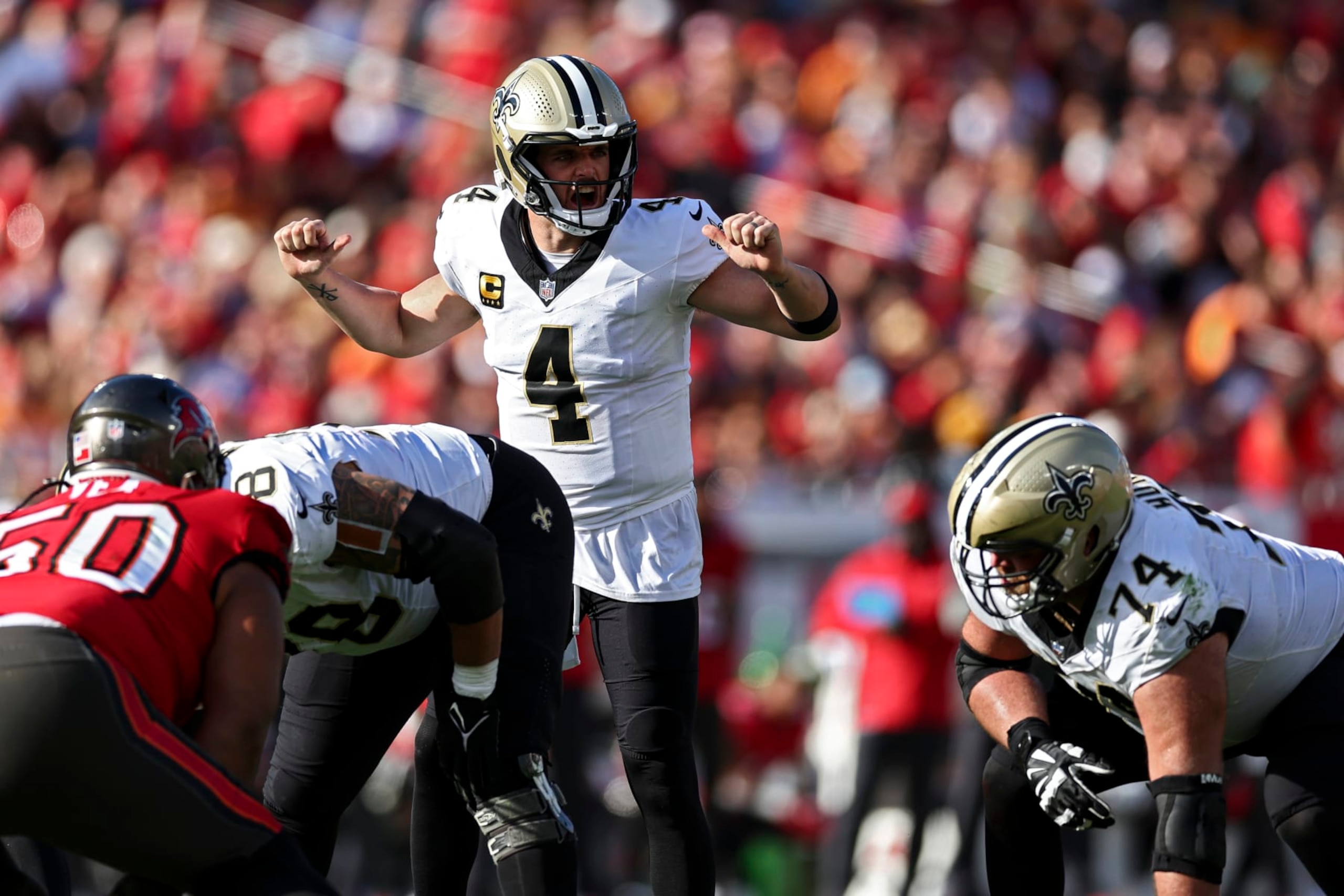 TAMPA, FL - DECEMBER 31: Derek Carr #4 of the New Orleans Saints calls a play at the line of scrimmage during the third quarter of an NFL football game against the Tampa Bay Buccaneers at Raymond James Stadium on December 31, 2023 in Tampa, Florida. (Photo by Kevin Sabitus/Getty Images)