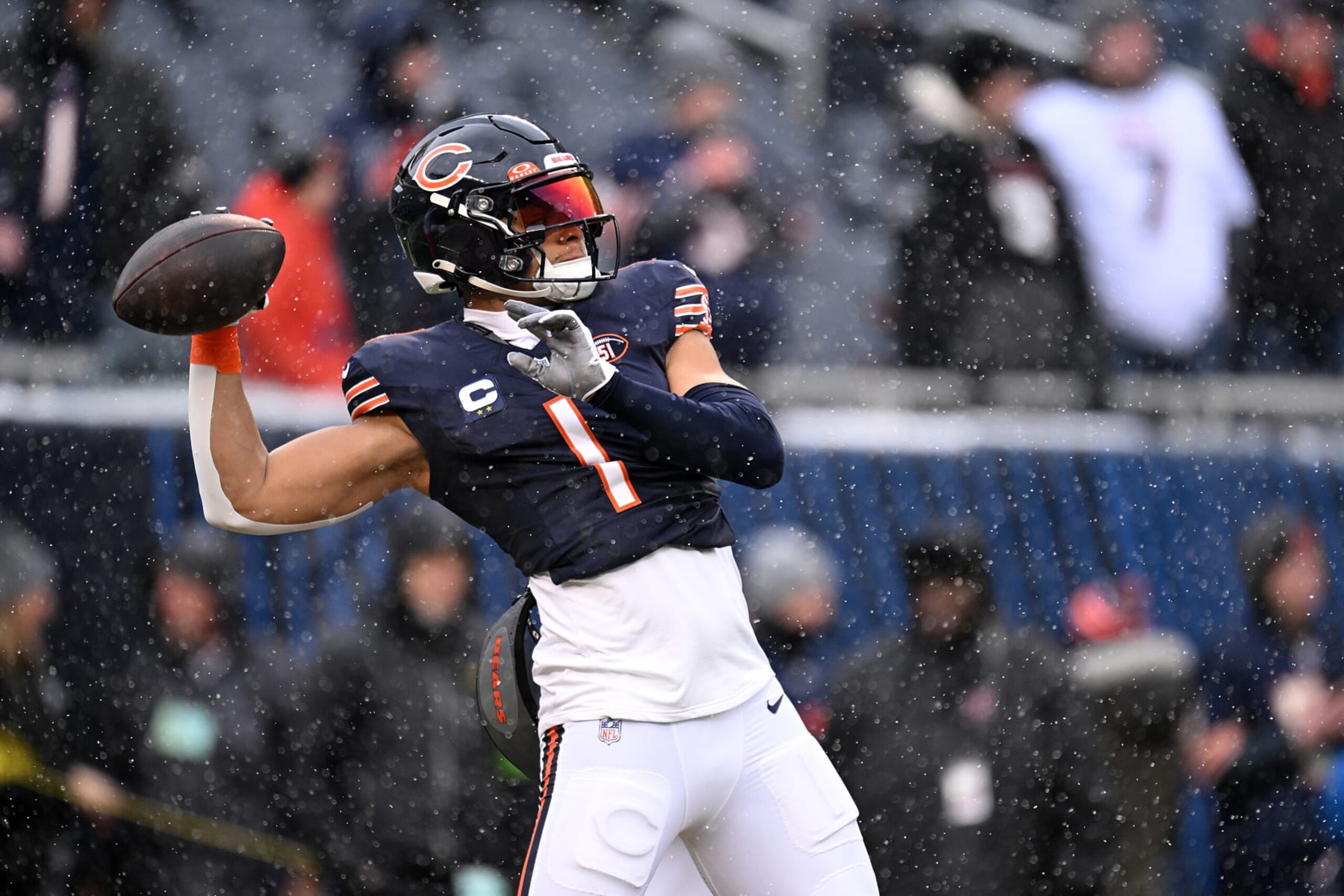 CHICAGO, ILLINOIS - DECEMBER 31: Justin Fields #1 of the Chicago Bears warms up prior to a game against the Atlanta Falcons at Soldier Field on December 31, 2023 in Chicago, Illinois. (Photo by Quinn Harris/Getty Images)