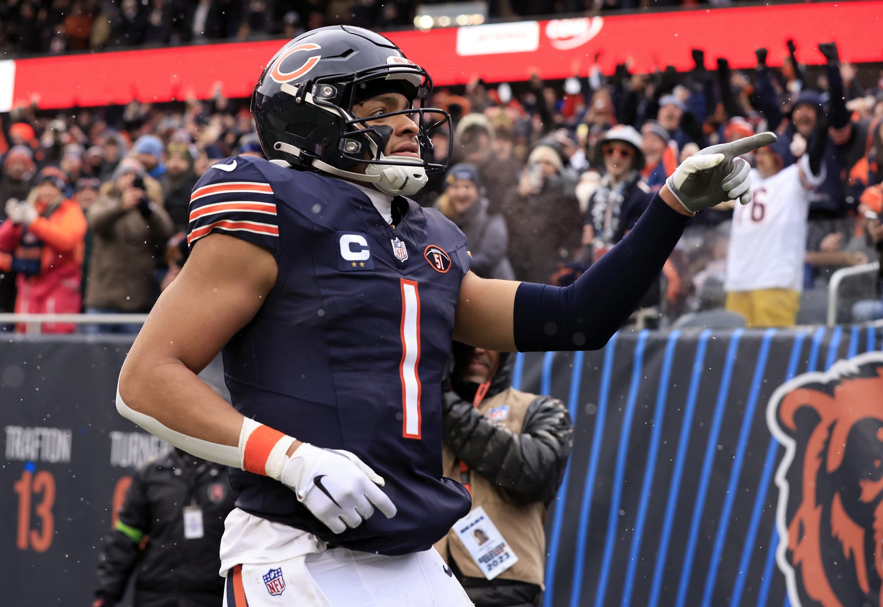 CHICAGO, ILLINOIS - DECEMBER 31: Justin Fields #1 of the Chicago Bears celebrates after his rushing touchdown during the second quarter against the Atlanta Falcons at Soldier Field on December 31, 2023 in Chicago, Illinois. (Photo by Justin Casterline/Getty Images)