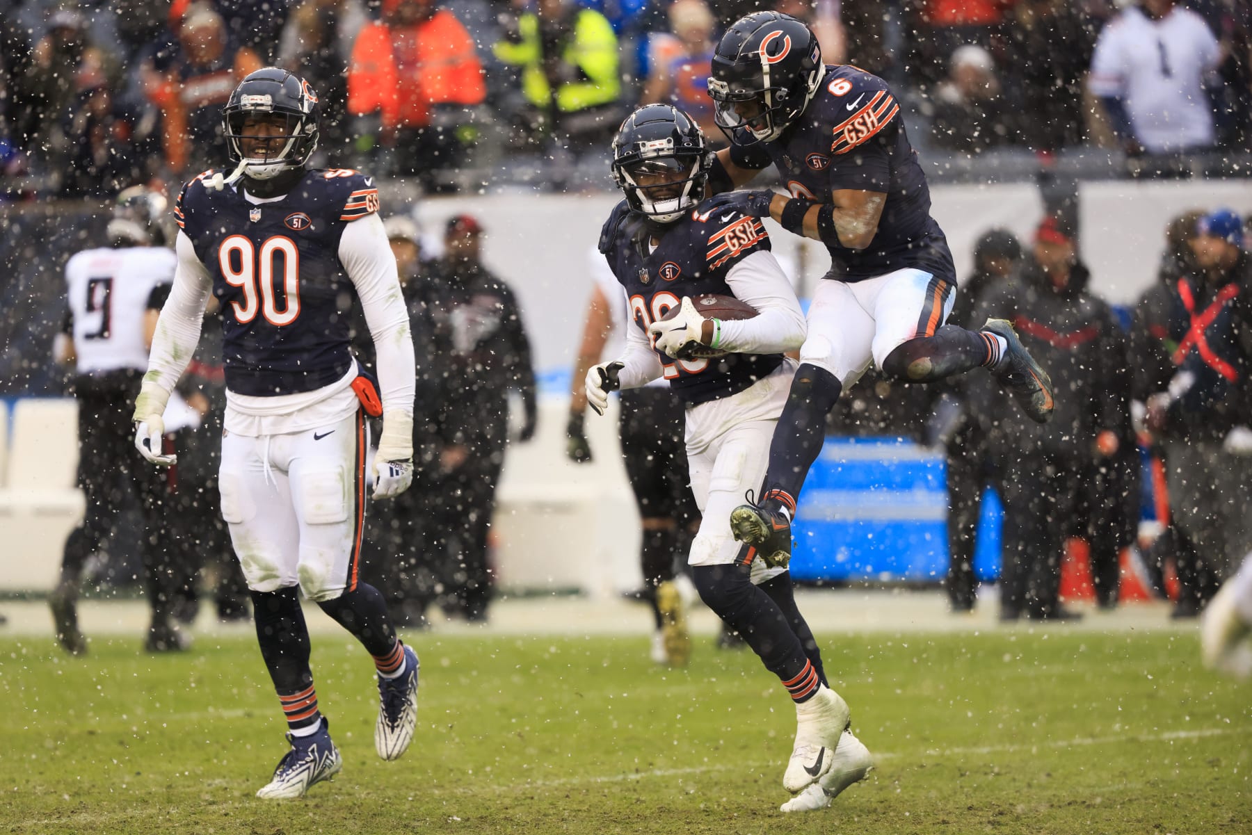 CHICAGO, ILLINOIS - DECEMBER 31: Tyrique Stevenson #29 of the Chicago Bears and Kyler Gordon #6 of the Chicago Bears celebrate after Stevenson's interception during the fourth quarter against the Atlanta Falcons at Soldier Field on December 31, 2023 in Chicago, Illinois. (Photo by Justin Casterline/Getty Images)