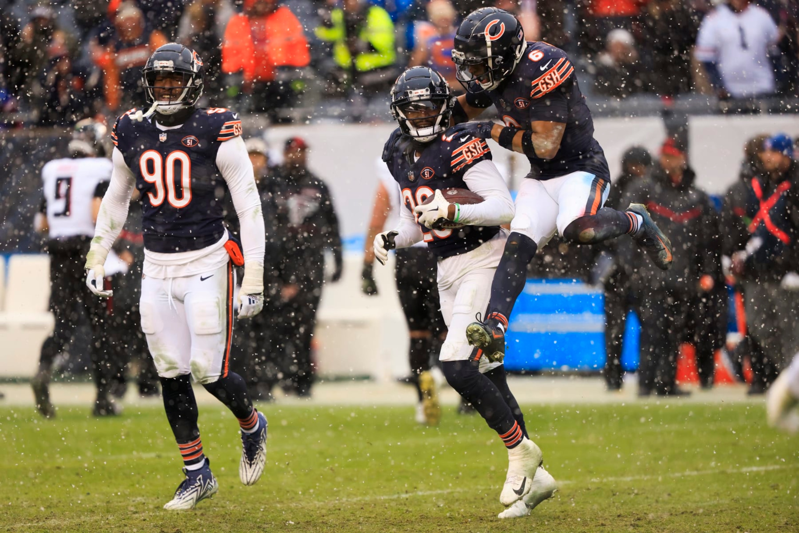 CHICAGO, ILLINOIS - DECEMBER 31: Tyrique Stevenson #29 of the Chicago Bears and Kyler Gordon #6 of the Chicago Bears celebrate after Stevenson's interception during the fourth quarter against the Atlanta Falcons at Soldier Field on December 31, 2023 in Chicago, Illinois. (Photo by Justin Casterline/Getty Images)