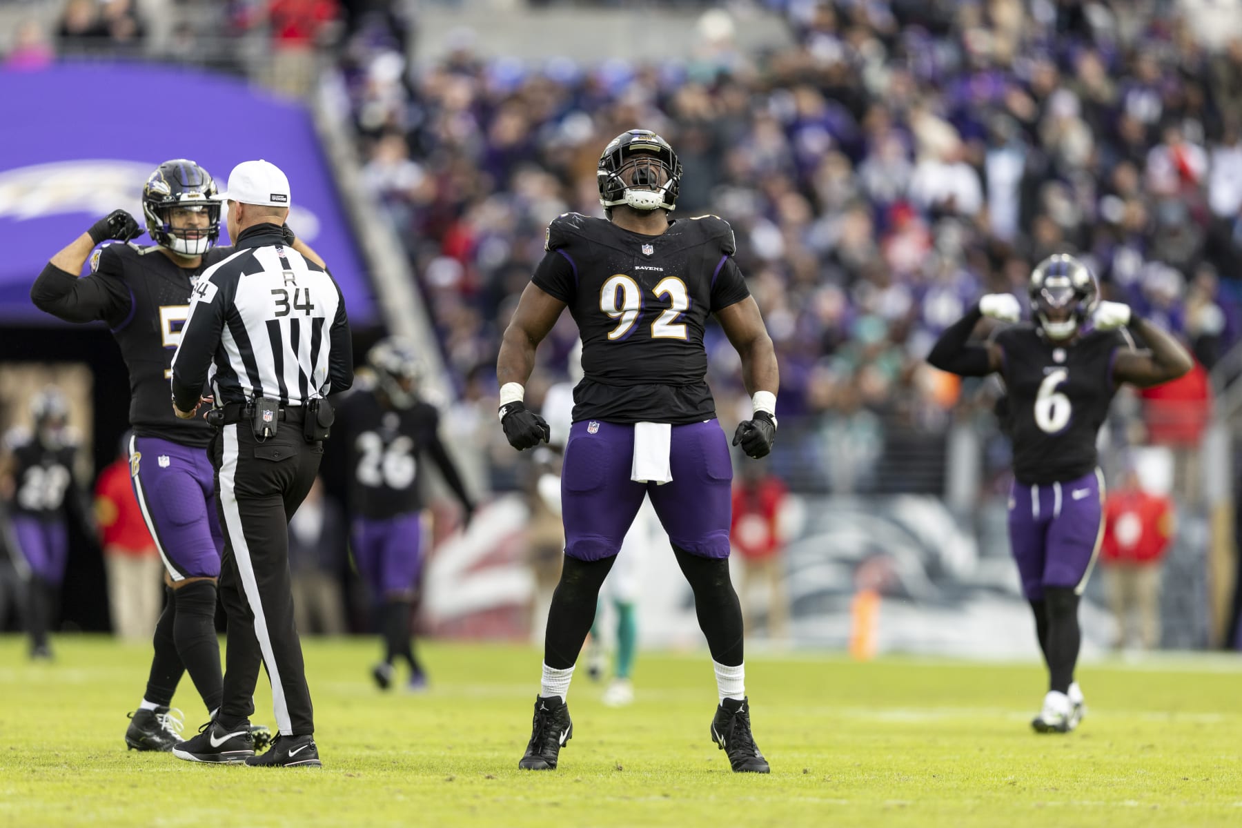 BALTIMORE, MARYLAND - DECEMBER 31: Justin Madubuike #92 of the Baltimore Ravens celebrates during an NFL football game between the Baltimore Ravens and the Miami Dolphins at M&T Bank Stadium on December 31, 2023 in Baltimore, Maryland. (Photo by Michael Owens/Getty Images)