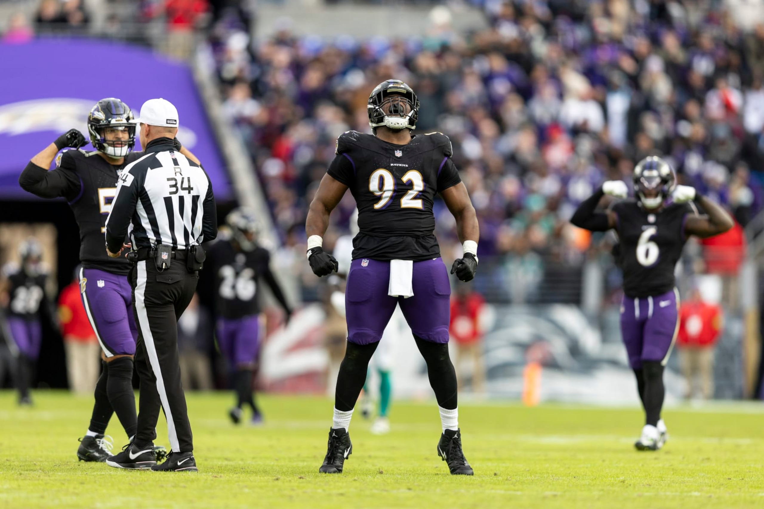 BALTIMORE, MARYLAND - DECEMBER 31: Justin Madubuike #92 of the Baltimore Ravens celebrates during an NFL football game between the Baltimore Ravens and the Miami Dolphins at M&T Bank Stadium on December 31, 2023 in Baltimore, Maryland. (Photo by Michael Owens/Getty Images)