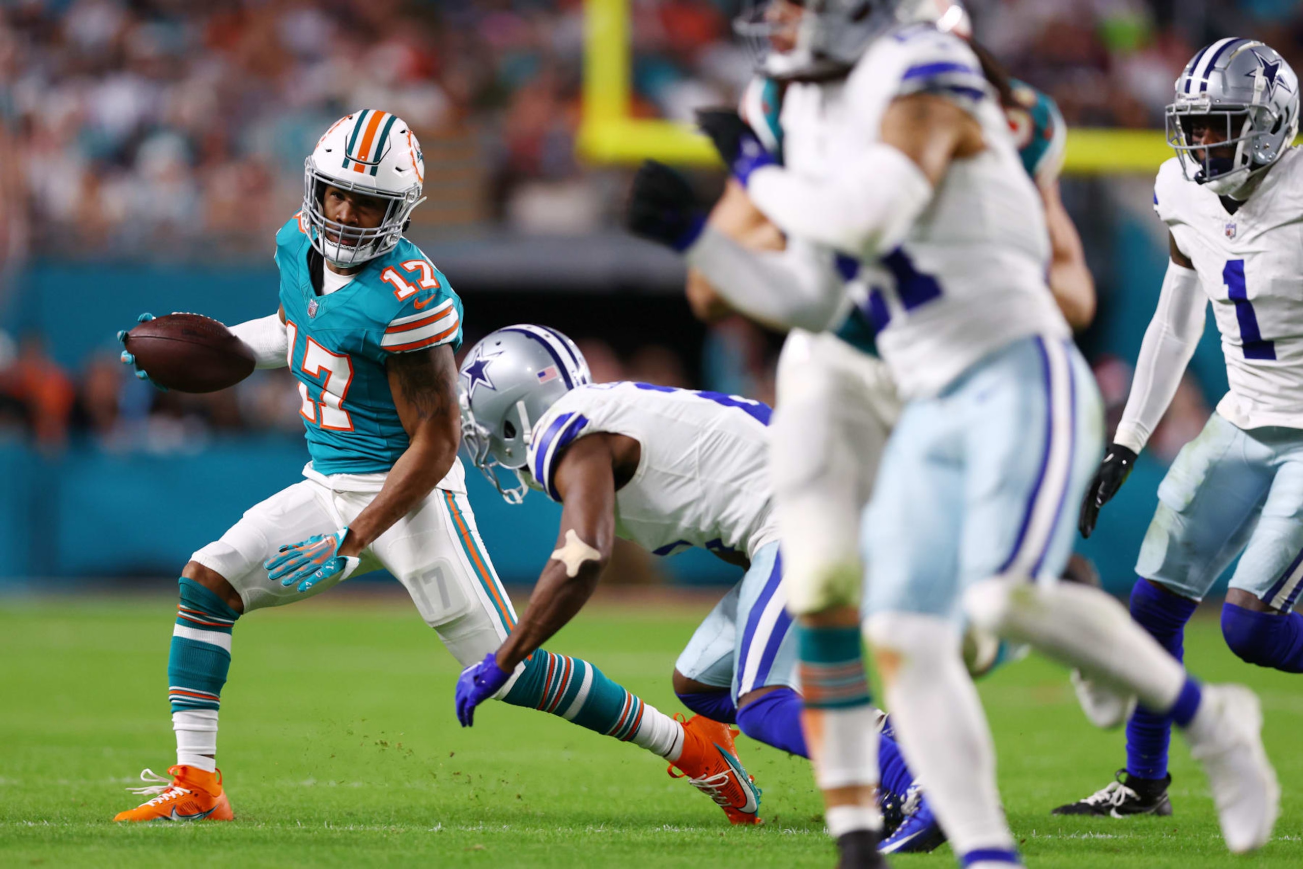 MIAMI GARDENS, FLORIDA - DECEMBER 24: Jaylen Waddle #17 of the Miami Dolphins runs the ball during the fourth quarter in the game against the Dallas Cowboys at Hard Rock Stadium on December 24, 2023 in Miami Gardens, Florida. (Photo by Megan Briggs/Getty Images)