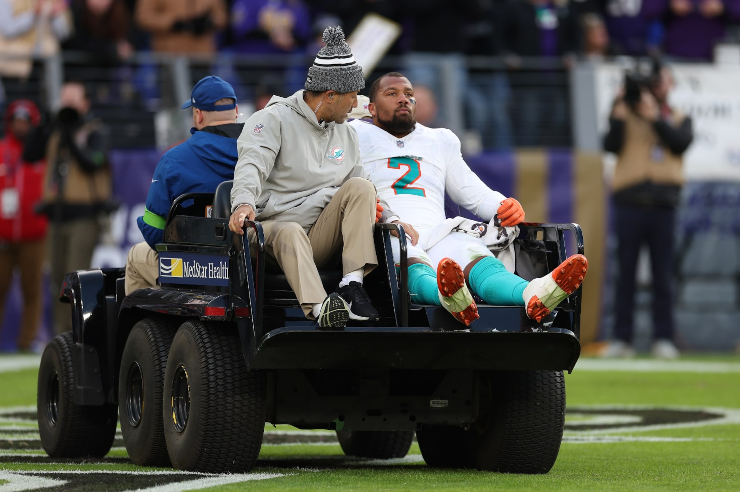 BALTIMORE, MARYLAND - DECEMBER 31: Bradley Chubb #2 of the Miami Dolphins leaves the field with an injury during the second half of the game against the Baltimore Ravens at M&T Bank Stadium on December 31, 2023 in Baltimore, Maryland. (Photo by Rob Carr/Getty Images)