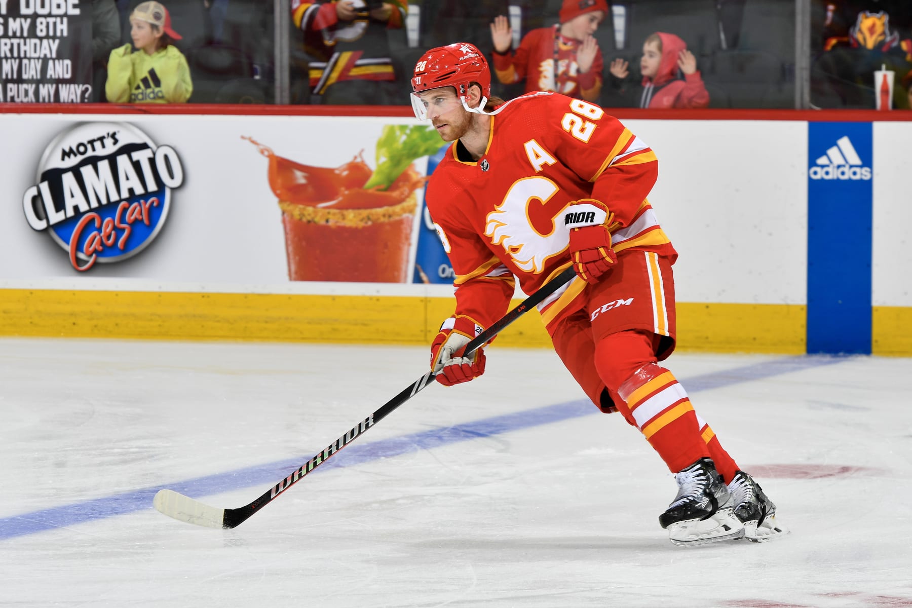 CALGARY, ALBERTA - DECEMBER 27: Elias Lindholm #28` of the Calgary Flames skates before the game against the Seattle Kraken at the Scotiabank Saddledome on December 27, 2023 in Calgary, Alberta. (Photo by Terence Leung/NHLI via Getty Images)