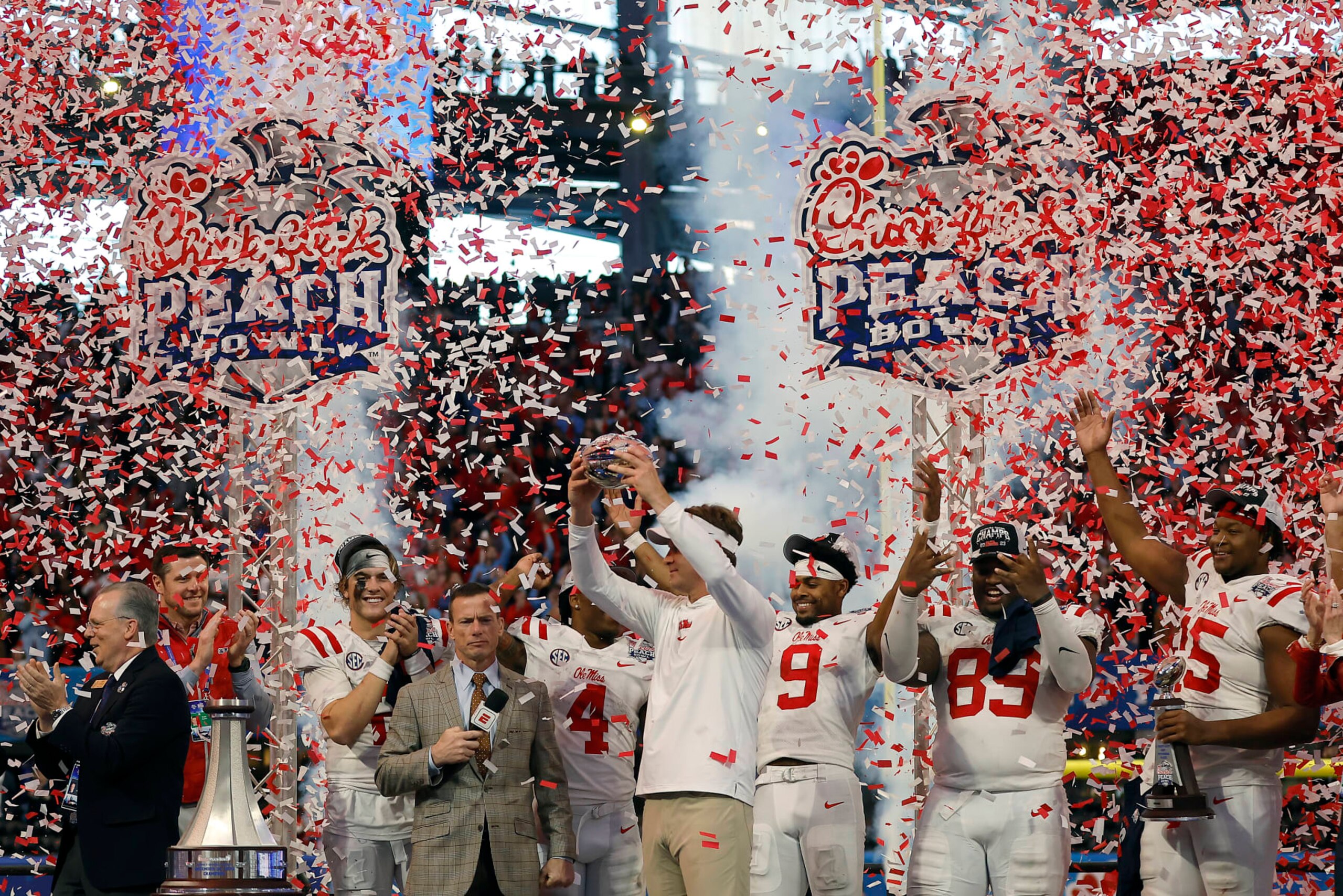 ATLANTA, GEORGIA - DECEMBER 30: Head coach Lane Kiffin of the Mississippi Rebels celebrates with the team after beating Penn State Nittany Lions during the Chick-fil-A Peach Bowl at Mercedes-Benz Stadium on December 30, 2023 in Atlanta, Georgia. (Photo by Alex Slitz/Getty Images)