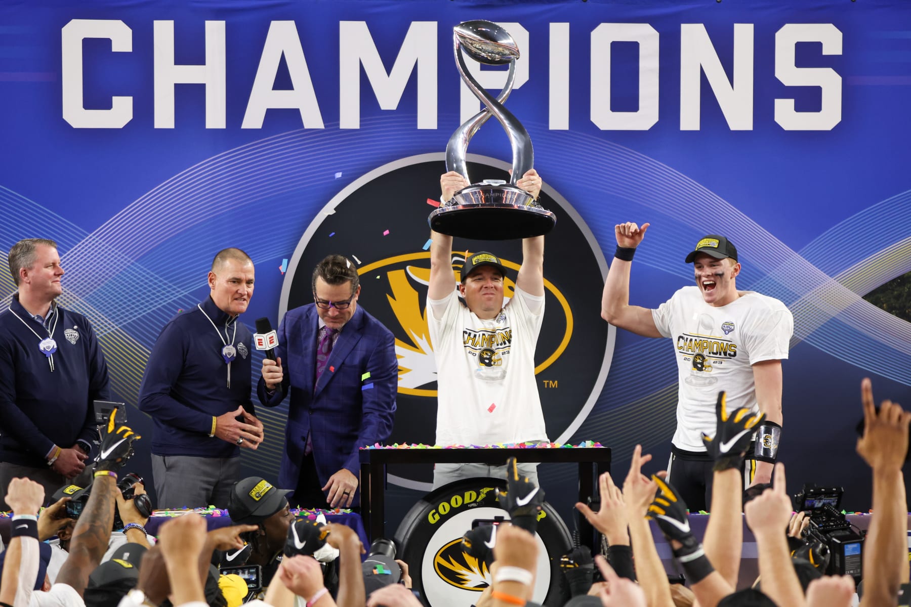 ARLINGTON, TX - DECEMBER 29: Missouri Tigers head coach Eliah Drinkwitz raises the trophy after winning the 88th Goodyear Cotton Bowl Classic between the Missouri Tigers and Ohio State Buckeyes on December 29, 2023 at AT&T Stadium in Arlington, TX. (Photo by George Walker/Icon Sportswire via Getty Images)