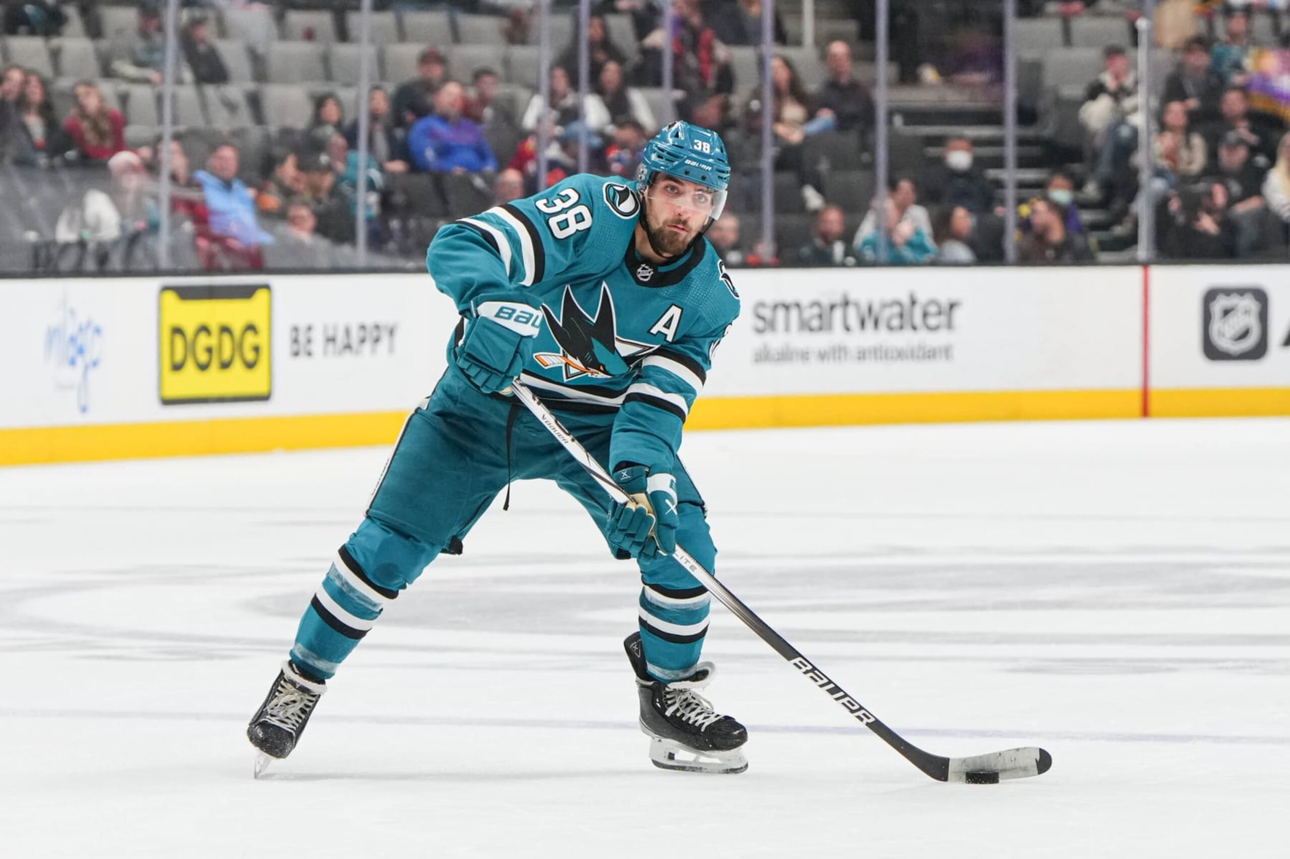 SAN JOSE, CALIFORNIA - DECEMBER 28: Mario Ferraro #38 of the San Jose Sharks skates with the puck at SAP Center on December 28, 2023 in San Jose, California. (Photo by Andreea Cardani/NHLI via Getty Images)