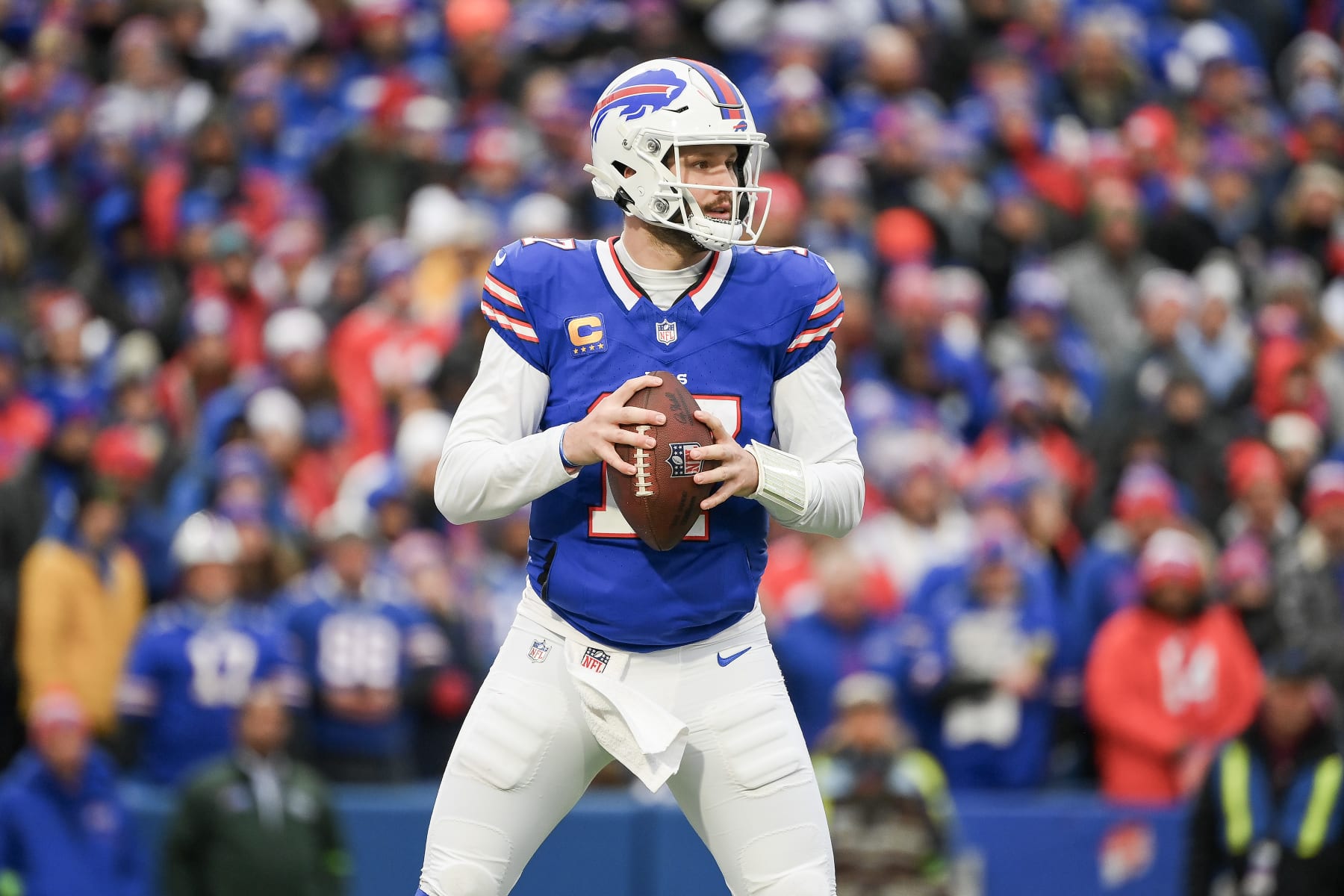 ORCHARD PARK, NEW YORK - DECEMBER 31: Josh Allen #17 of the Buffalo Bills looks to pass against the New England Patriots during the second half of the game at Highmark Stadium on December 31, 2023 in Orchard Park, New York. (Photo by Rich Barnes/Getty Images)