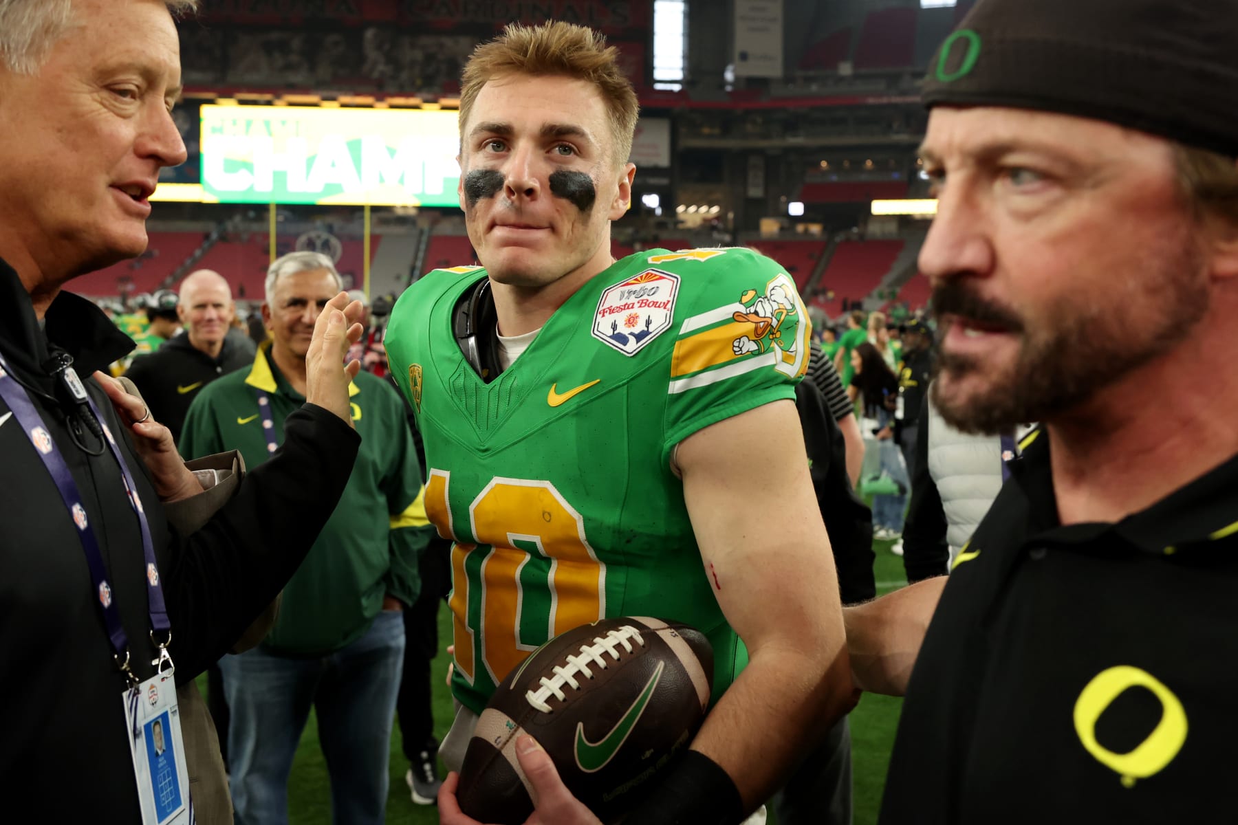 GLENDALE, AZ - JANUARY 01: Oregon Ducks quarterback Bo Nix (10) walks off the field after the second half of Vrbo Fiesta Bowl college football game between the Oregon Ducks and the Liberty Flames on January 1, 2024, at State Farm Stadium in Phoenix, AZ. (Photo by Zac BonDurant/Icon Sportswire via Getty Images)