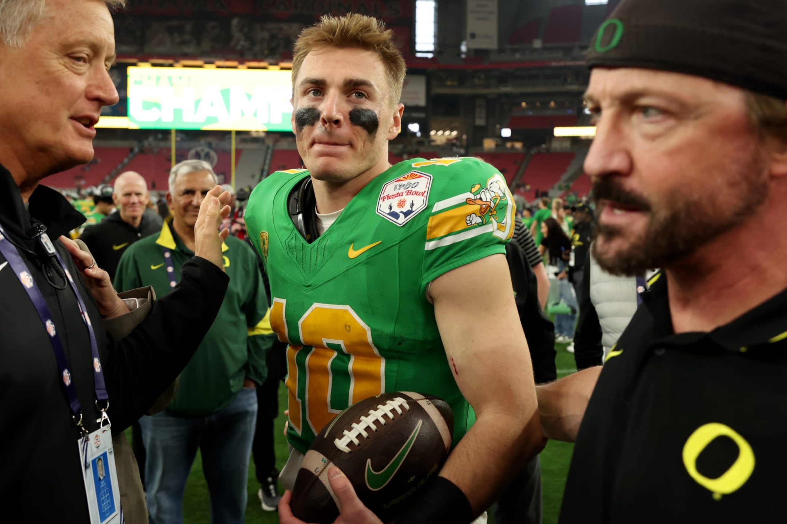 GLENDALE, AZ - JANUARY 01: Oregon Ducks quarterback Bo Nix (10) walks off the field after the second half of Vrbo Fiesta Bowl college football game between the Oregon Ducks and the Liberty Flames on January 1, 2024, at State Farm Stadium in Phoenix, AZ. (Photo by Zac BonDurant/Icon Sportswire via Getty Images)
