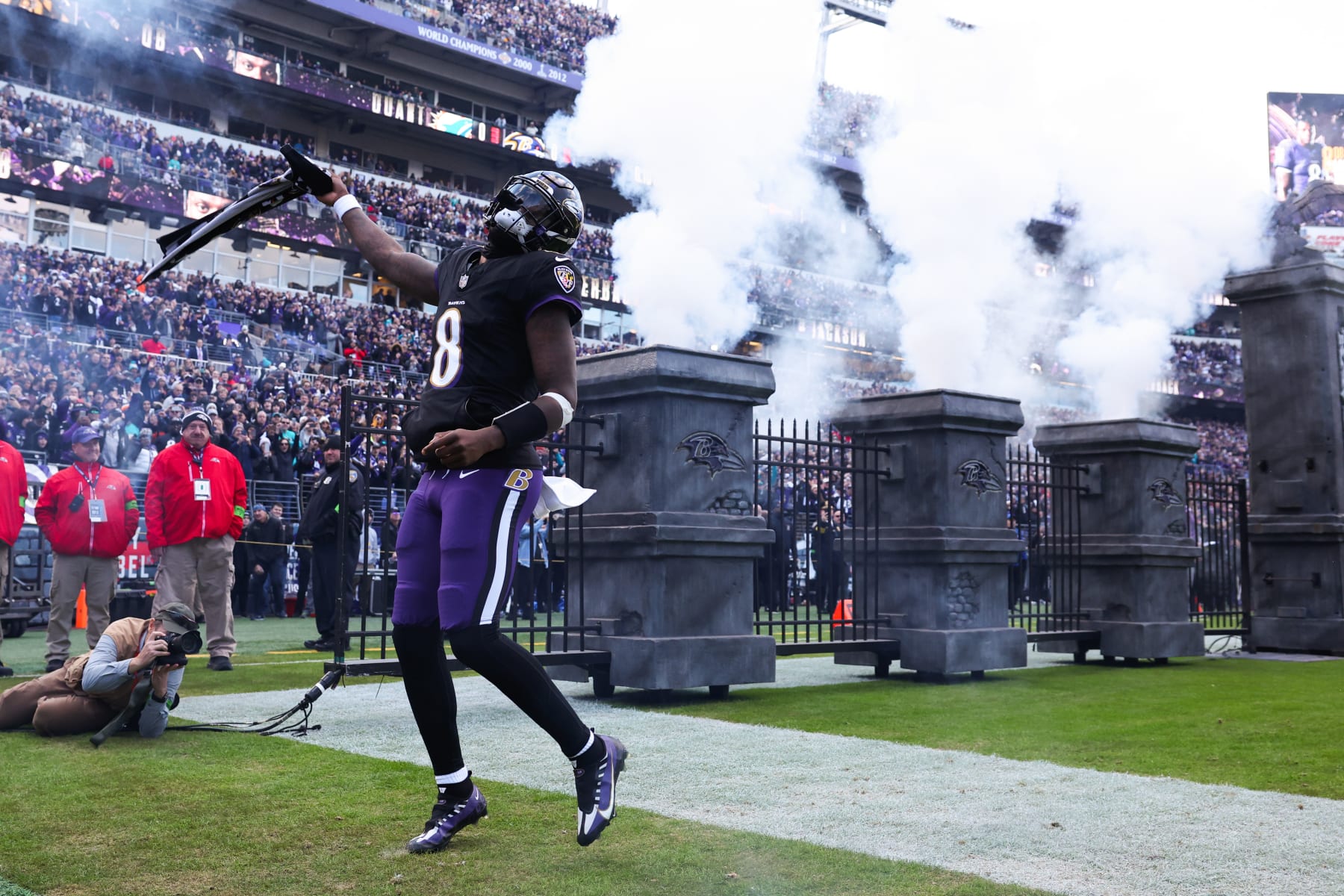 BALTIMORE, MARYLAND - DECEMBER 31: Lamar Jackson #8 of the Baltimore Ravens takes the field prior to a game against the Miami Dolphins at M&T Bank Stadium on December 31, 2023 in Baltimore, Maryland. (Photo by Todd Olszewski/Getty Images)