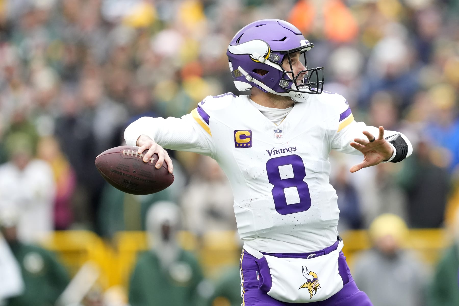 GREEN BAY, WISCONSIN - OCTOBER 29: Kirk Cousins #8 of the Minnesota Vikings looks to throw a pass in the first half against the Green Bay Packers at Lambeau Field on October 29, 2023 in Green Bay, Wisconsin. (Photo by Patrick McDermott/Getty Images)