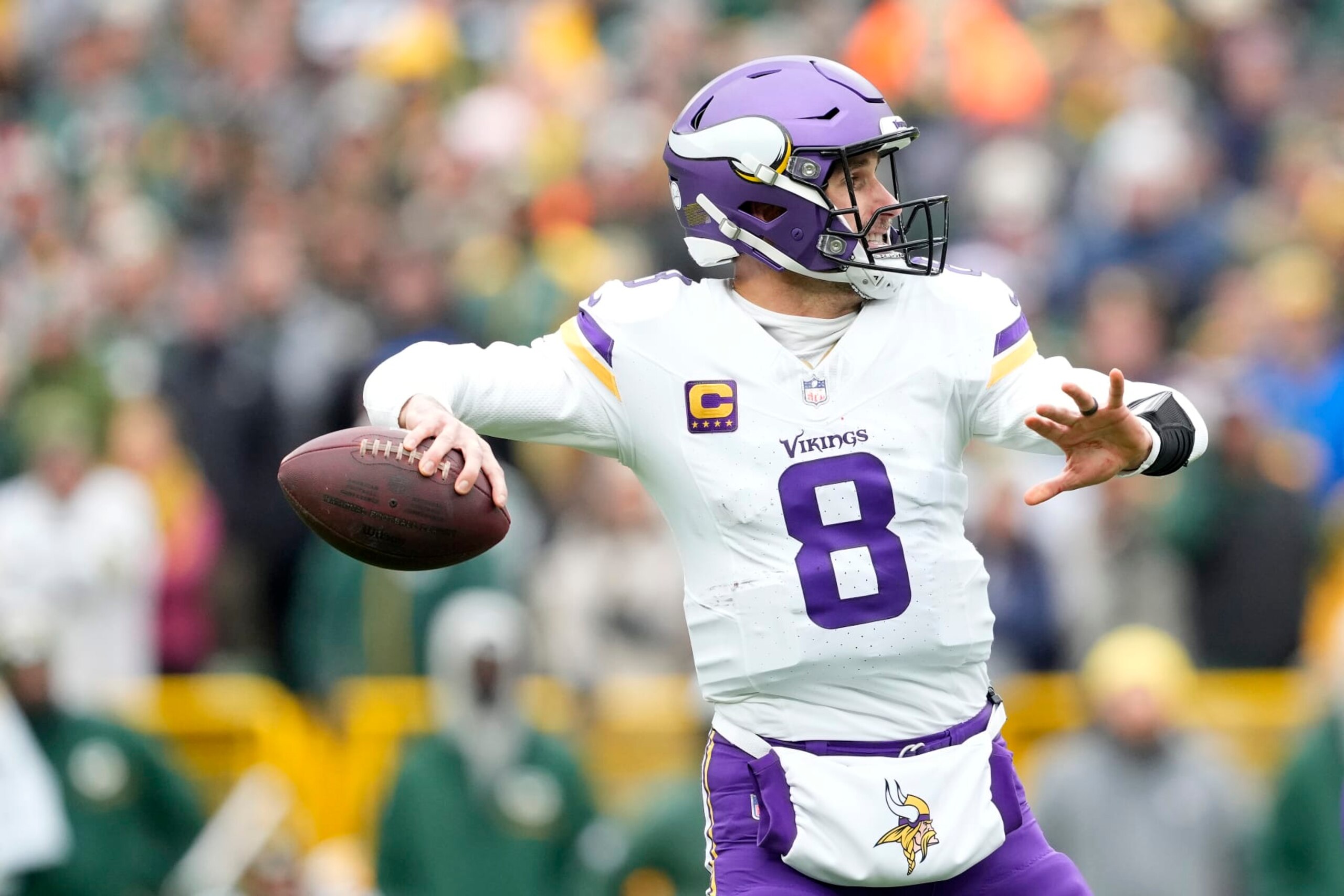 GREEN BAY, WISCONSIN - OCTOBER 29: Kirk Cousins #8 of the Minnesota Vikings looks to throw a pass in the first half against the Green Bay Packers at Lambeau Field on October 29, 2023 in Green Bay, Wisconsin. (Photo by Patrick McDermott/Getty Images)