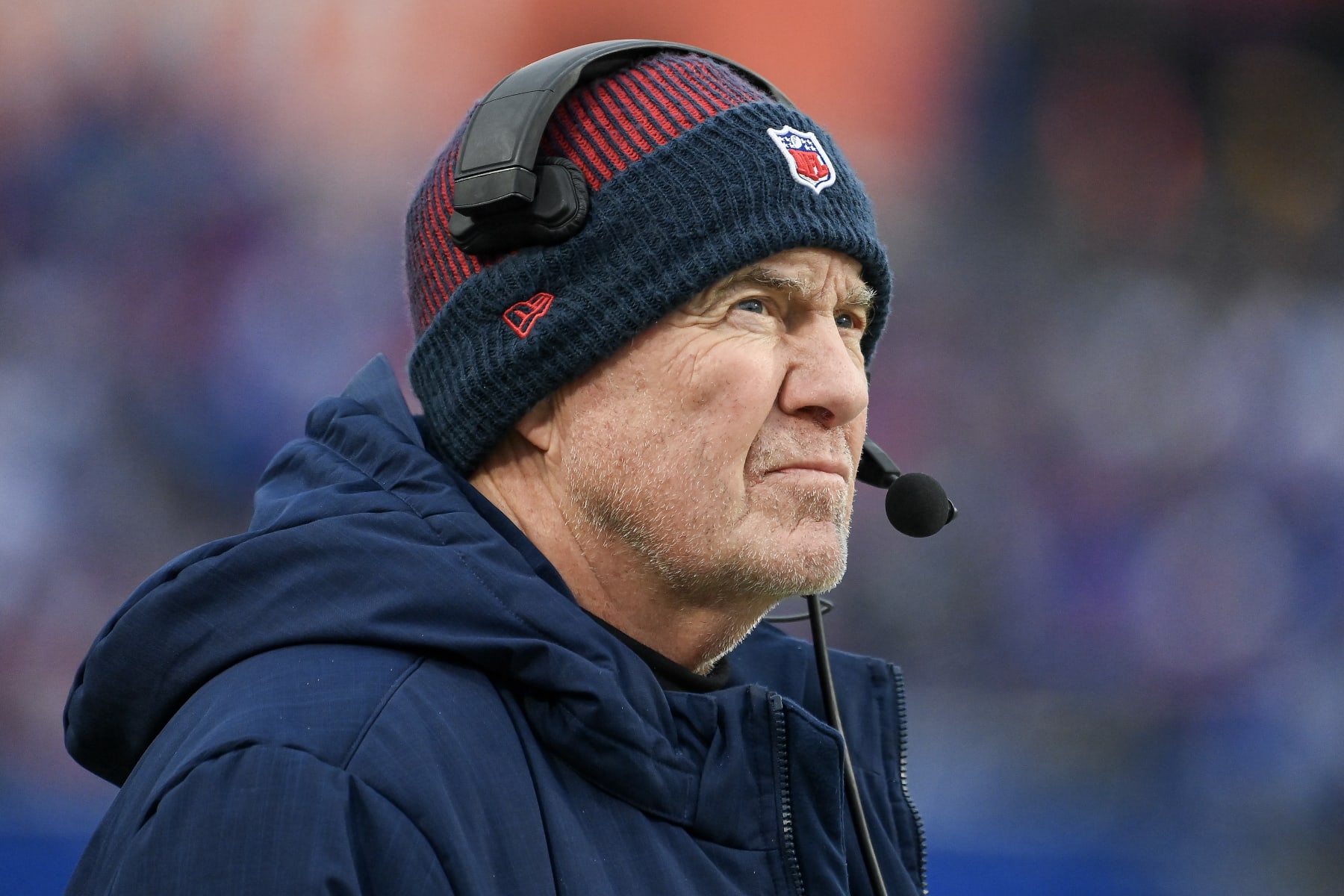 ORCHARD PARK, NEW YORK - DECEMBER 31: Head coach Bill Belichick of the New England Patriots looks on during the first half of a game against the Buffalo Bills at Highmark Stadium on December 31, 2023 in Orchard Park, New York. (Photo by Rich Barnes/Getty Images)