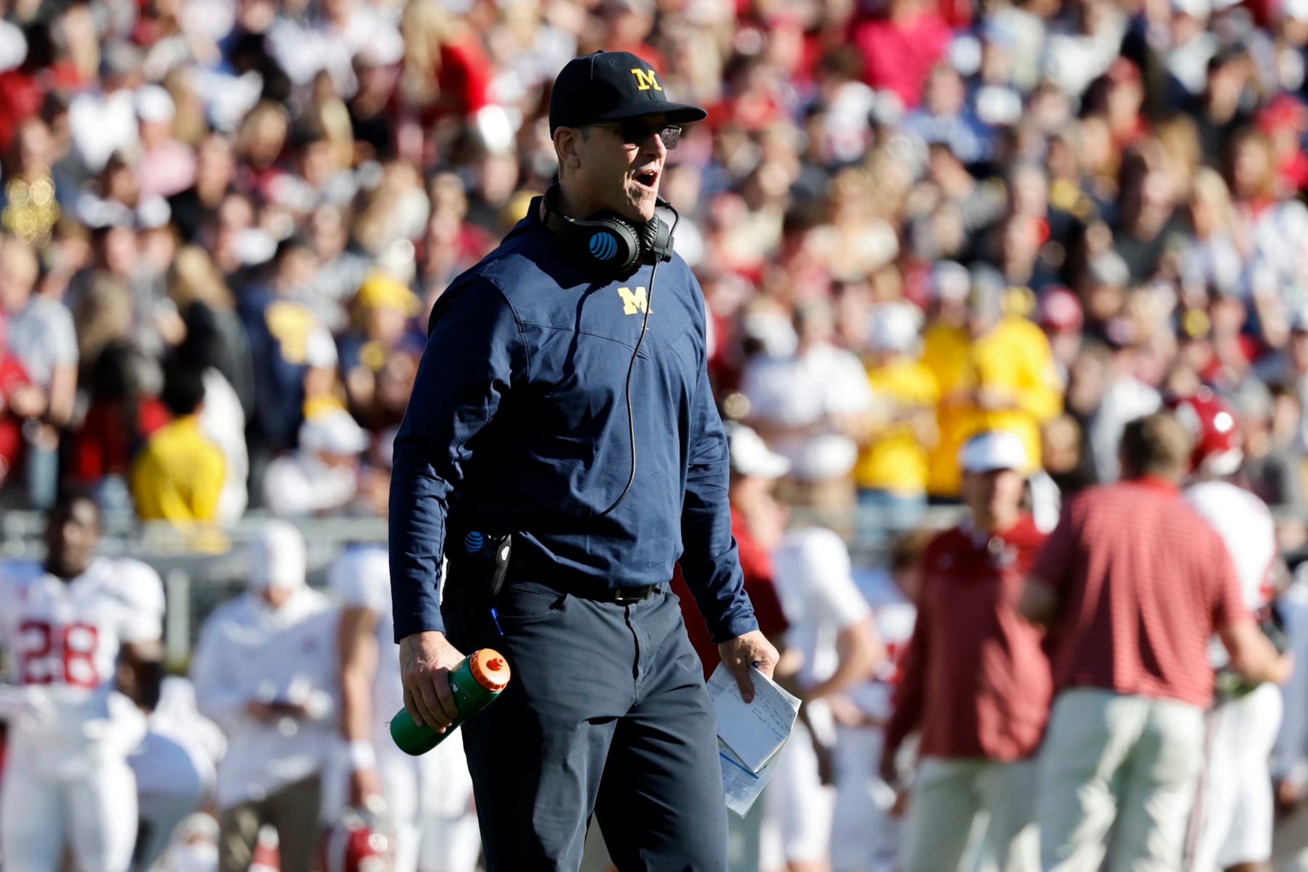 PASADENA, CALIFORNIA - JANUARY 01: Head coach Jim Harbaugh of the Michigan Wolverines walks across the field in the first quarter against the Alabama Crimson Tide during the CFP Semifinal Rose Bowl Game at Rose Bowl Stadium on January 01, 2024 in Pasadena, California. (Photo by Kevork Djansezian/Getty Images)