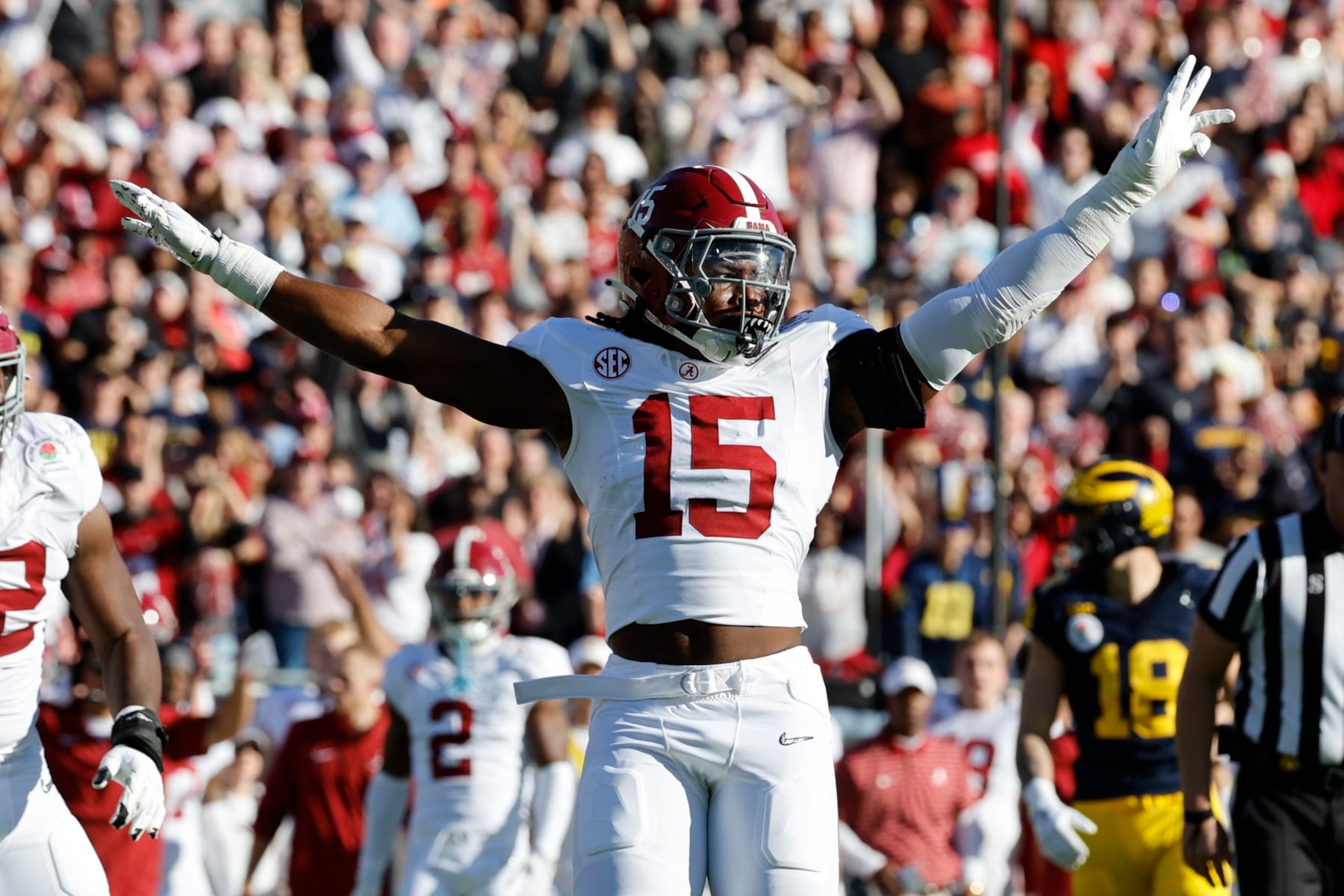 PASADENA, CALIFORNIA - JANUARY 01: Dallas Turner #15 of the Alabama Crimson Tide celebrates in the first quarter against the Michigan Wolverines during the CFP Semifinal Rose Bowl Game at Rose Bowl Stadium on January 01, 2024 in Pasadena, California. (Photo by Kevork Djansezian/Getty Images)
