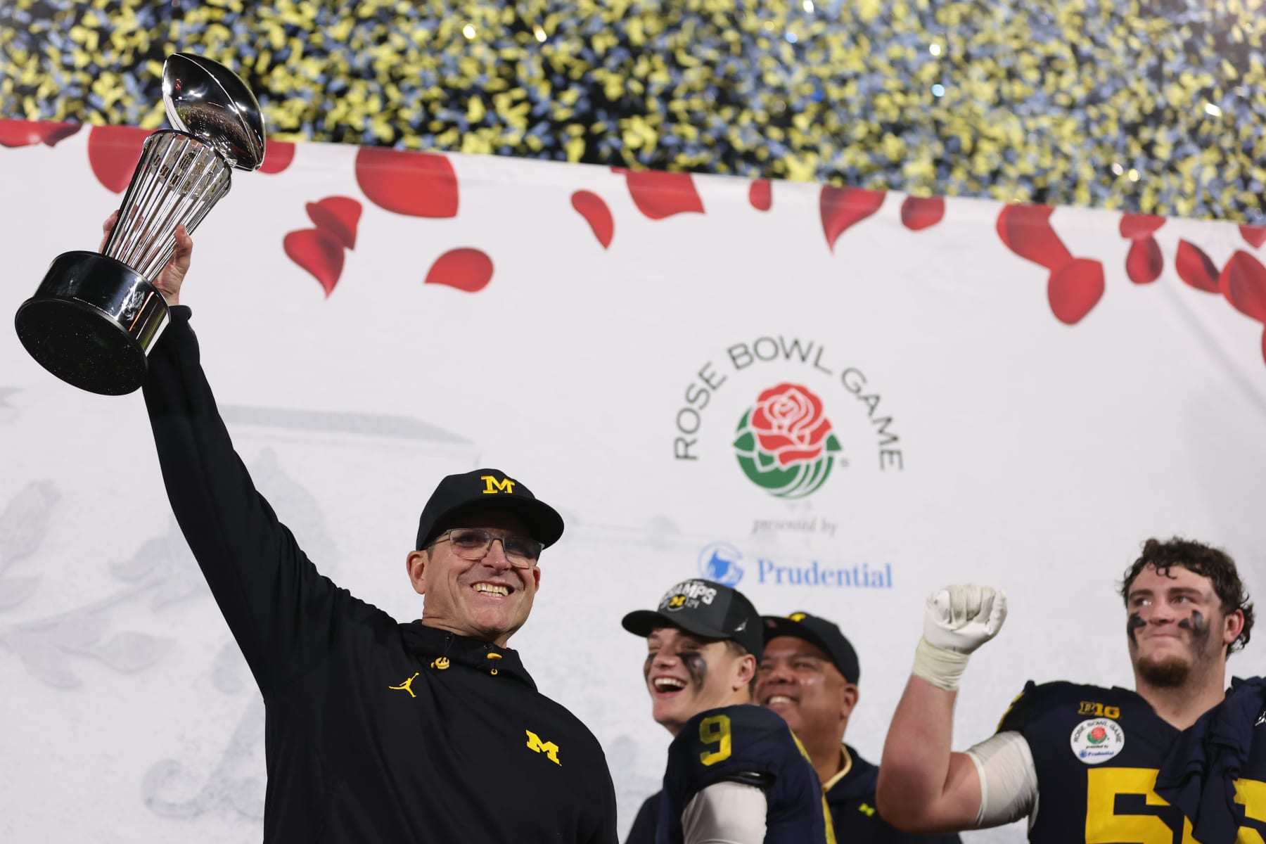 PASADENA, CALIFORNIA - JANUARY 01: Head coach Jim Harbaugh of the Michigan Wolverines celebrates with The Leishman Trophy after beating the Alabama Crimson Tide 27-20 in overtime to win the CFP Semifinal Rose Bowl Game at Rose Bowl Stadium on January 01, 2024 in Pasadena, California. (Photo by Sean M. Haffey/Getty Images)