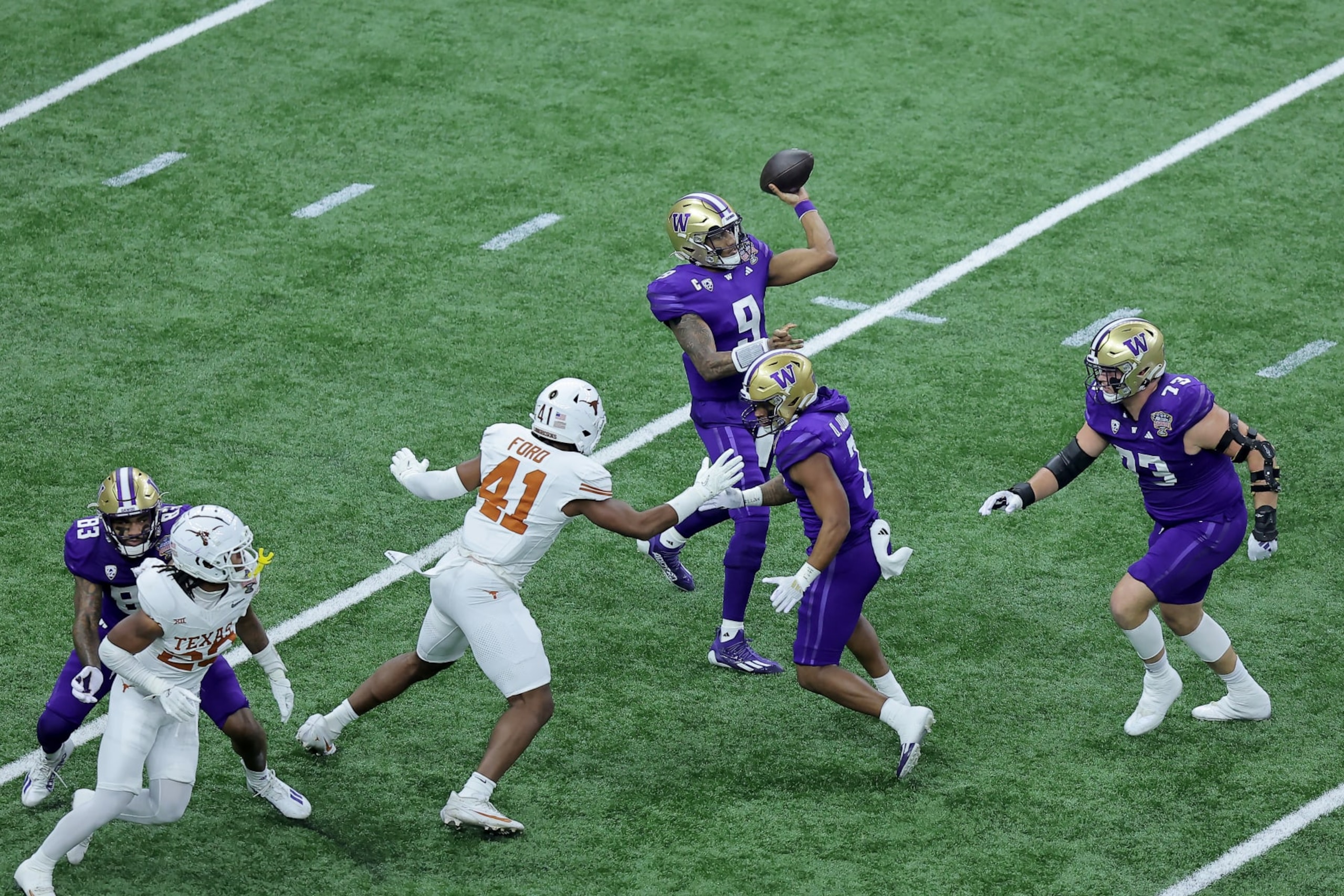 NEW ORLEANS, LOUISIANA - JANUARY 01: Michael Penix Jr. #9 of the Washington Huskies throws a pass during the first quarter against the Texas Longhorns during the CFP Semifinal Allstate Sugar Bowl at Caesars Superdome on January 01, 2024 in New Orleans, Louisiana. (Photo by Jonathan Bachman/Getty Images)