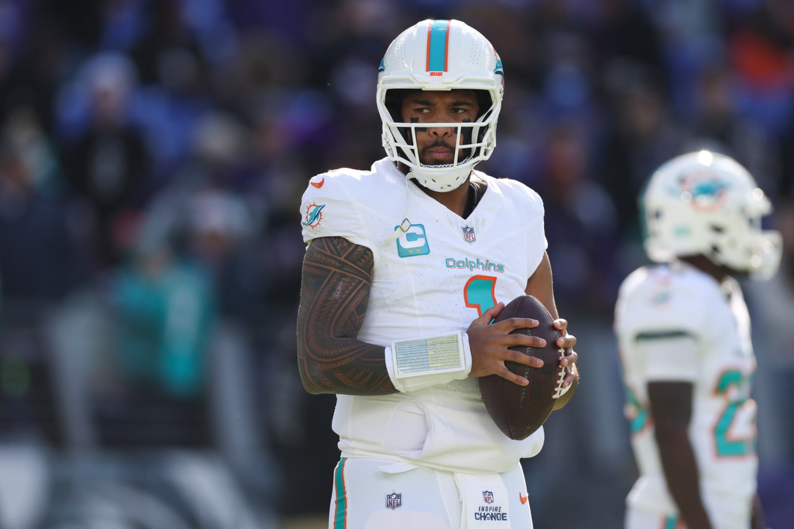 BALTIMORE, MARYLAND - DECEMBER 31: Tua Tagovailoa #1 of the Miami Dolphins warms up prior to a game against the Baltimore Ravens at M&T Bank Stadium on December 31, 2023 in Baltimore, Maryland. (Photo by Rob Carr/Getty Images)