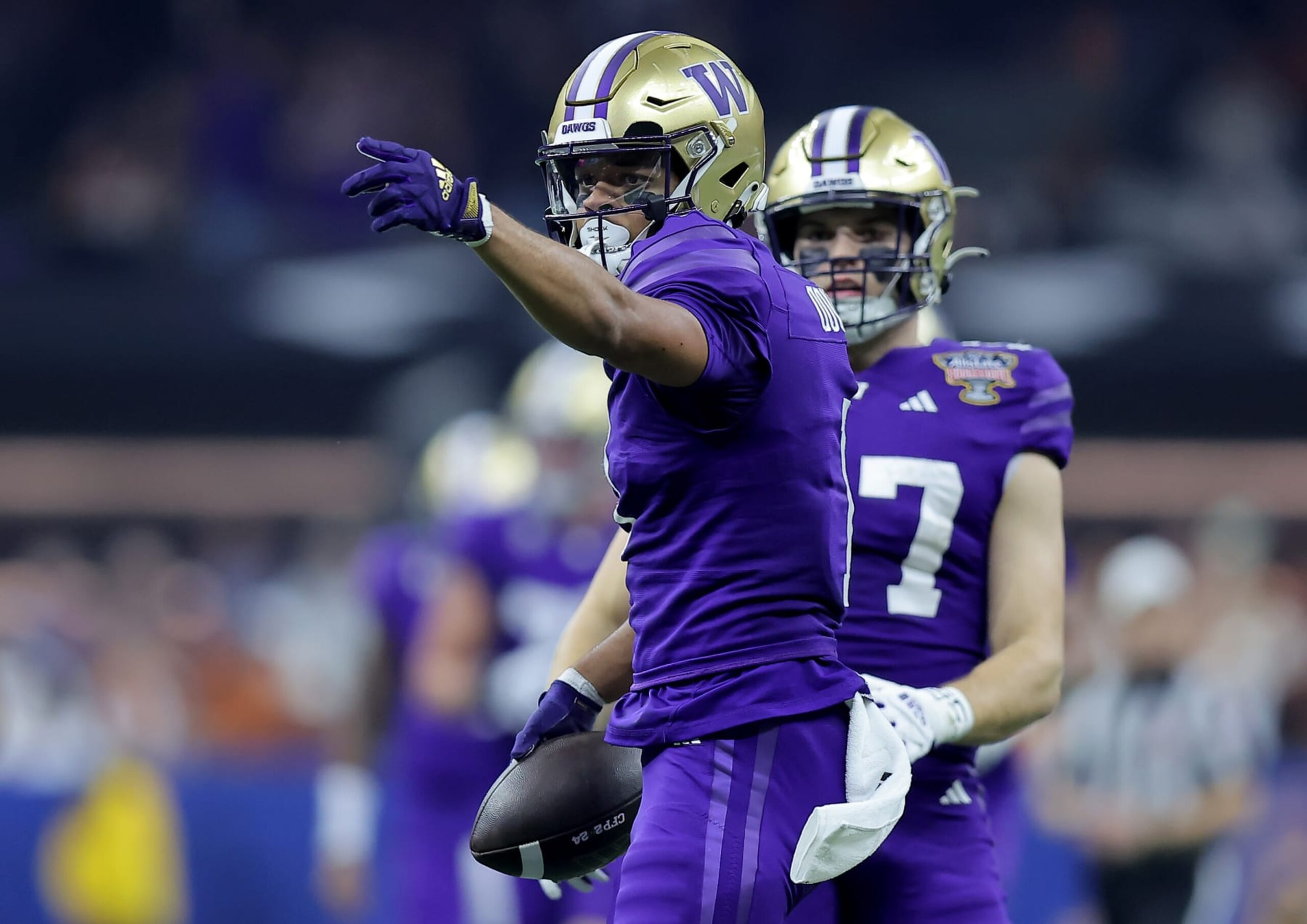 NEW ORLEANS, LOUISIANA - JANUARY 01: Rome Odunze #1 of the Washington Huskies celebrates after a first down during the first quarter against the Texas Longhorns during the CFP Semifinal Allstate Sugar Bowl at Caesars Superdome on January 01, 2024 in New Orleans, Louisiana. (Photo by Jonathan Bachman/Getty Images)