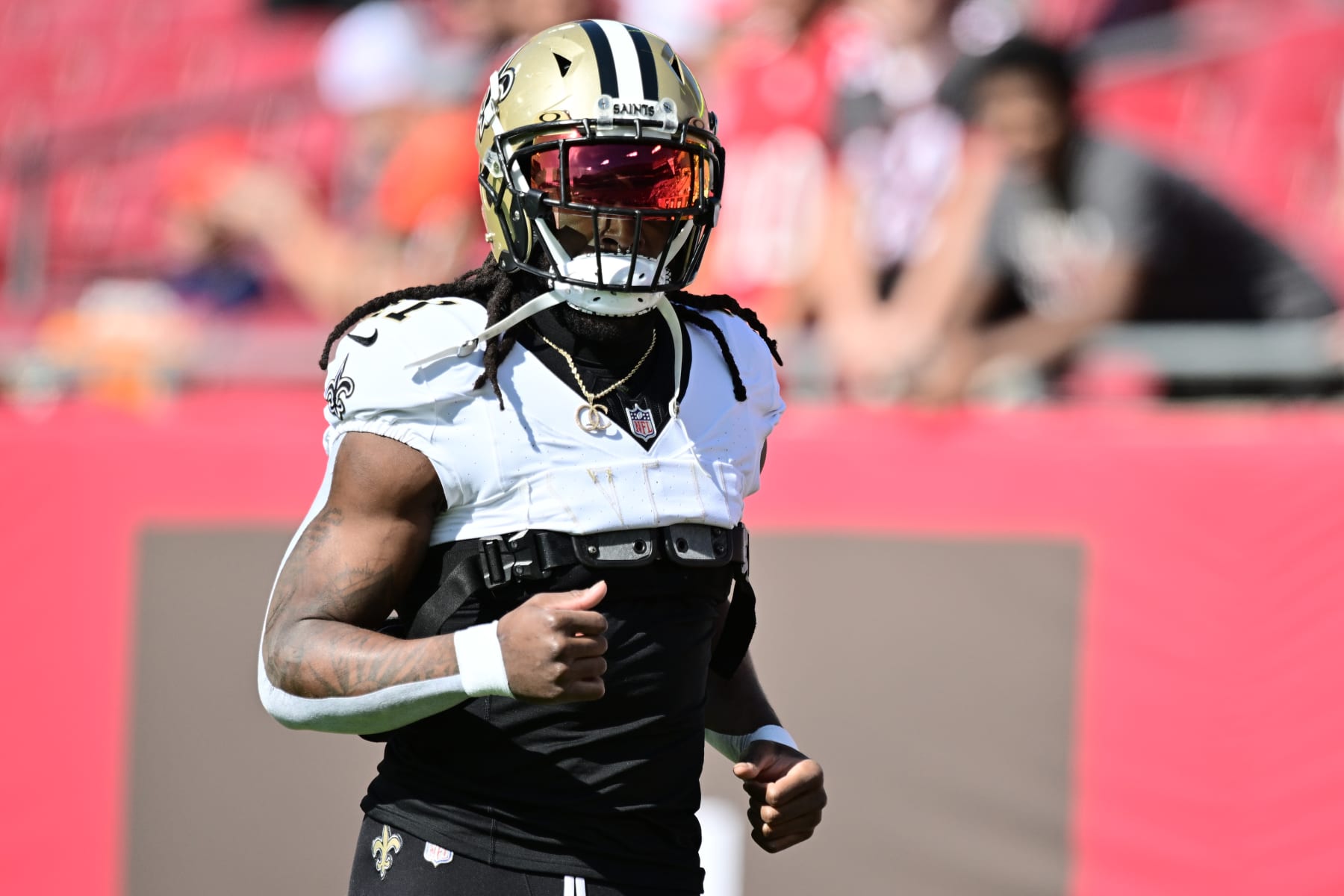 TAMPA, FLORIDA - DECEMBER 31: Alvin Kamara #41 of the New Orleans Saints warms up before the game against the Tampa Bay Buccaneers at Raymond James Stadium on December 31, 2023 in Tampa, Florida. (Photo by Julio Aguilar/Getty Images)