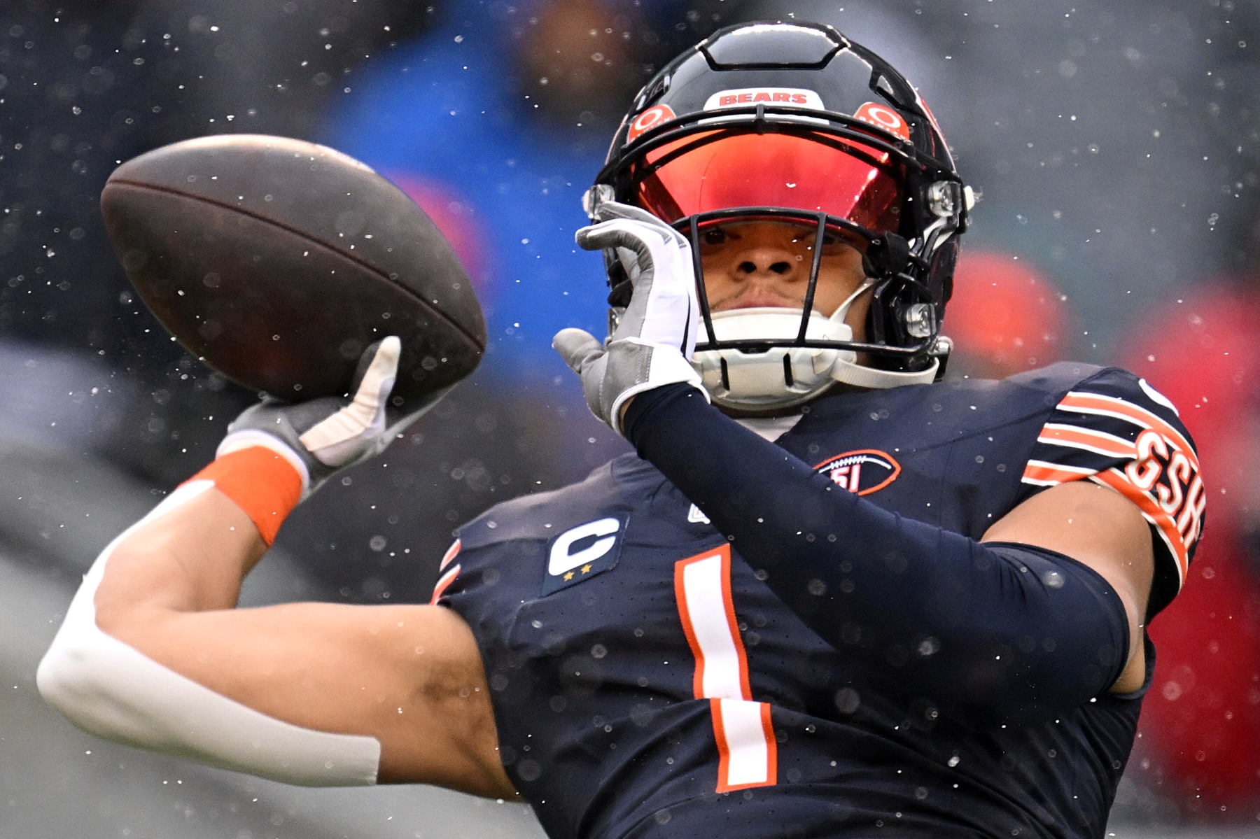 CHICAGO, ILLINOIS - DECEMBER 31: Justin Fields #1 of the Chicago Bears warms up prior to a game against the Atlanta Falcons at Soldier Field on December 31, 2023 in Chicago, Illinois. (Photo by Quinn Harris/Getty Images)