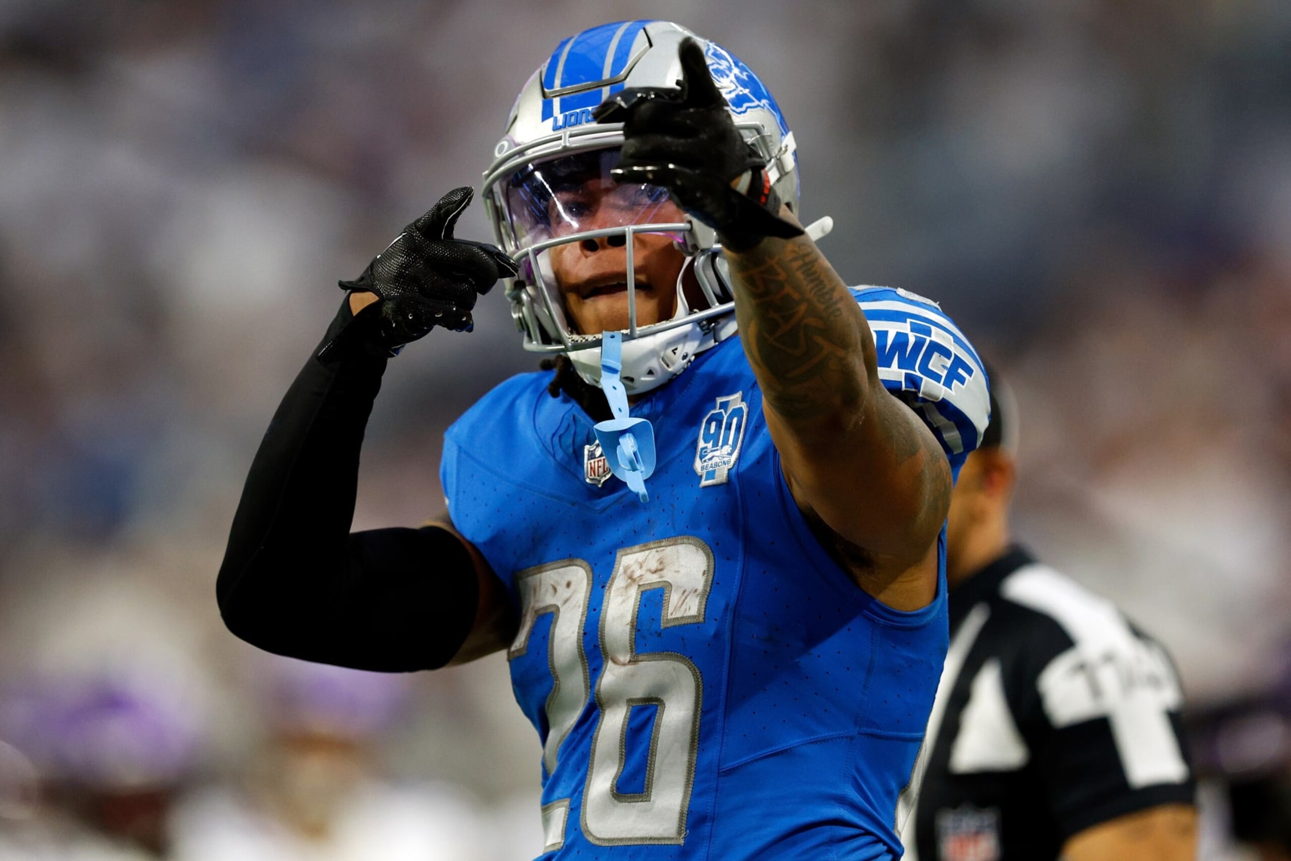 MINNEAPOLIS, MINNESOTA - DECEMBER 24: Jahmyr Gibbs #26 of the Detroit Lions celebrates against the Minnesota Vikings in the second half at U.S. Bank Stadium on December 24, 2023 in Minneapolis, Minnesota. The Lions defeated the Vikings 30-24. (Photo by David Berding/Getty Images)