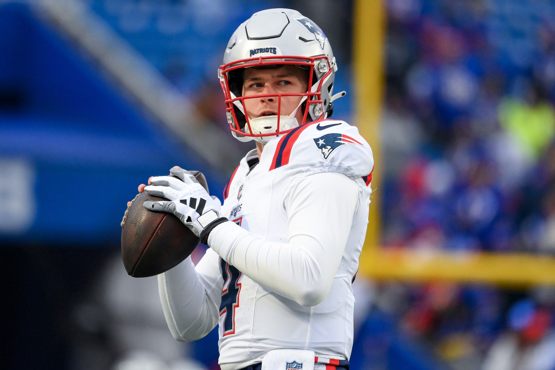 ORCHARD PARK, NEW YORK - DECEMBER 31: Bailey Zappe #4 of the New England Patriots warms up prior to a game against the Buffalo Bills at Highmark Stadium on December 31, 2023 in Orchard Park, New York. (Photo by Rich Barnes/Getty Images)