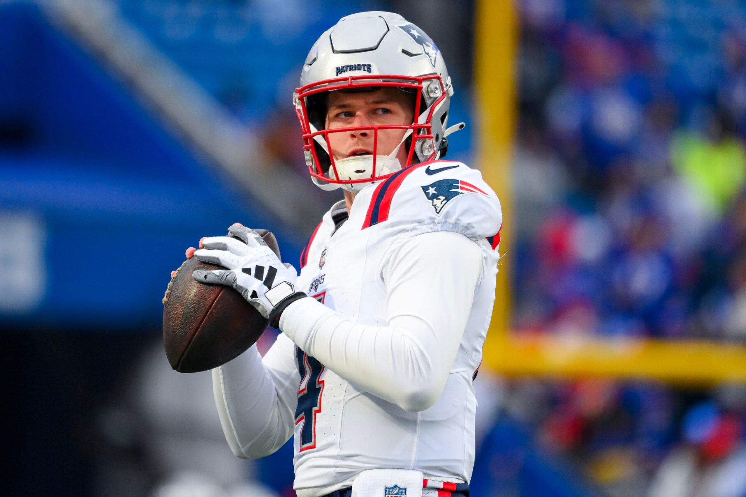 ORCHARD PARK, NEW YORK - DECEMBER 31: Bailey Zappe #4 of the New England Patriots warms up prior to a game against the Buffalo Bills at Highmark Stadium on December 31, 2023 in Orchard Park, New York. (Photo by Rich Barnes/Getty Images)