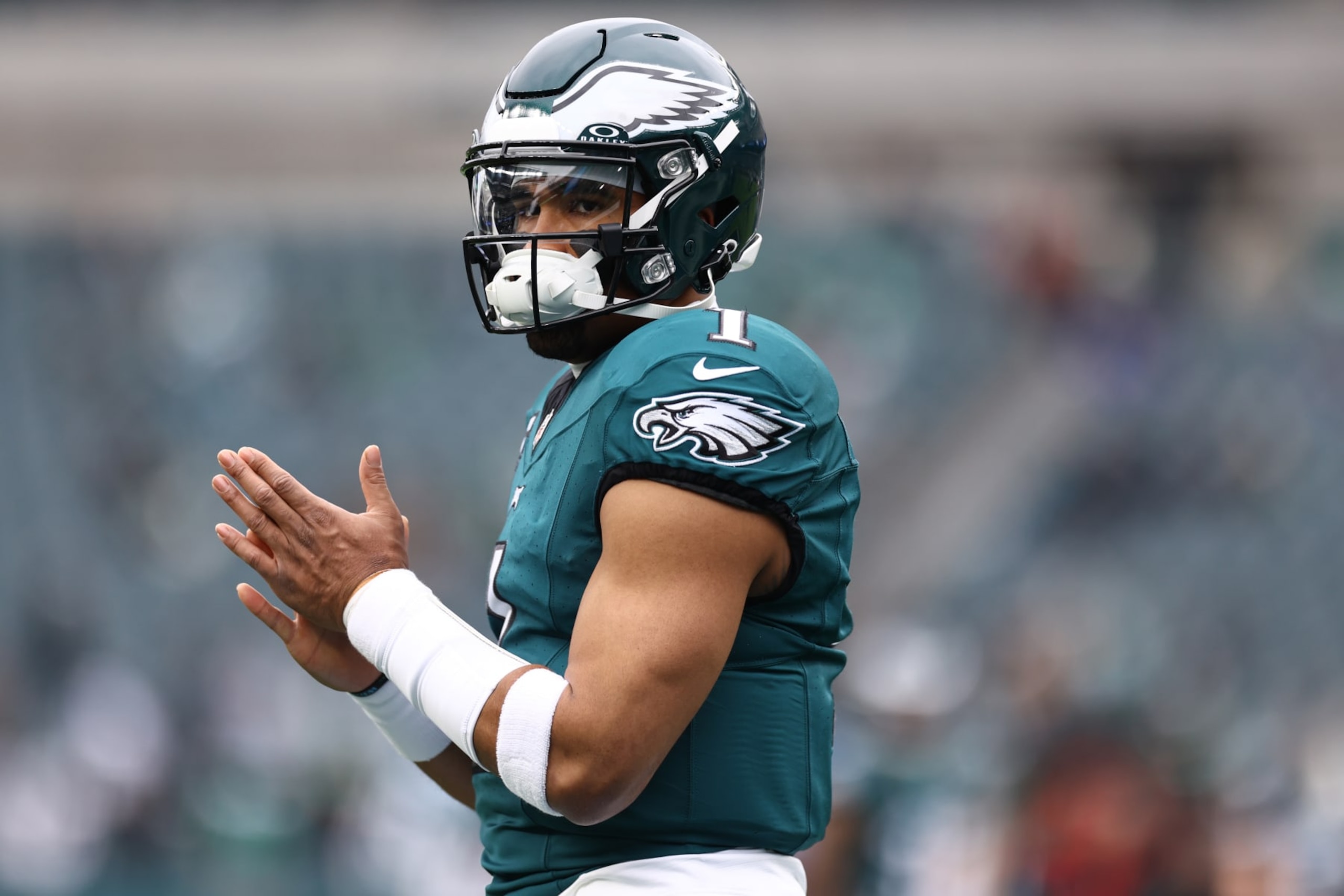 PHILADELPHIA, PENNSYLVANIA - DECEMBER 31: Jalen Hurts #1 of the Philadelphia Eagles warms up before the game against the Arizona Cardinals at Lincoln Financial Field on December 31, 2023 in Philadelphia, Pennsylvania. (Photo by Tim Nwachukwu/Getty Images)