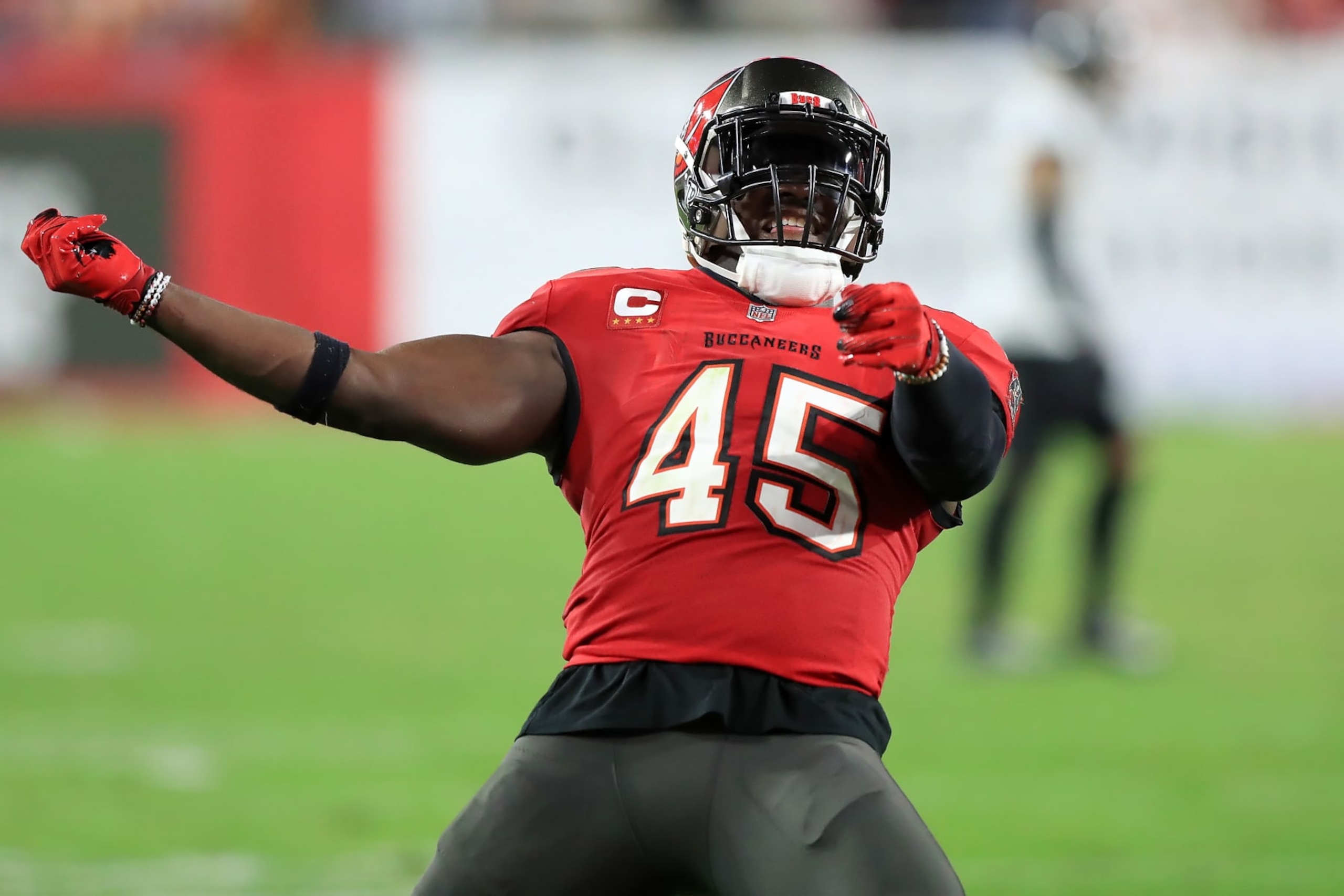 TAMPA, FL - DECEMBER 24: Tampa Bay Buccaneers Linebacker Devin White (45) celebrates a defensive stop during the regular season game between the Jacksonville Jaguars and the Tampa Bay Buccaneers on December 24, 2023 at Raymond James Stadium in Tampa, Florida. (Photo by Cliff Welch/Icon Sportswire via Getty Images)