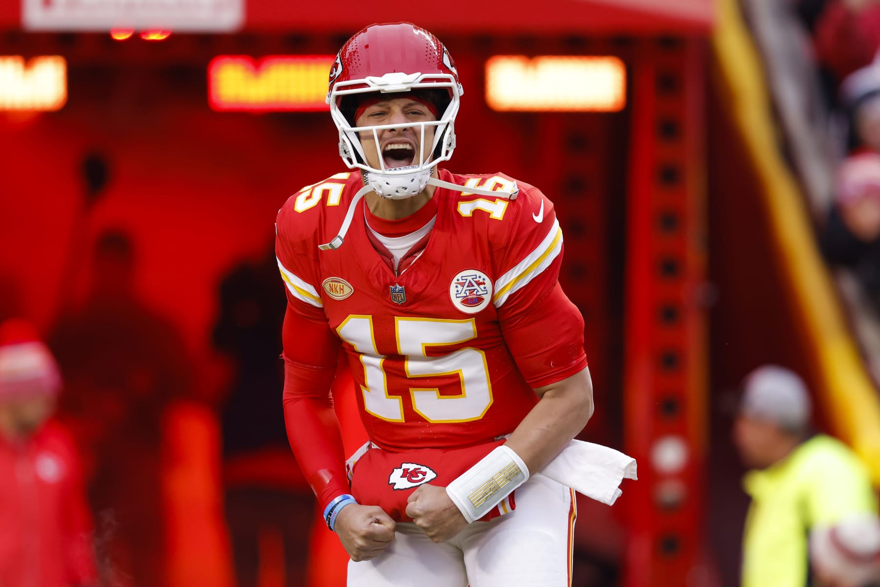 KANSAS CITY, MISSOURI - DECEMBER 31: Patrick Mahomes #15 of the Kansas City Chiefs runs onto the field before the game against the Cincinnati Bengals at GEHA Field at Arrowhead Stadium on December 31, 2023 in Kansas City, Missouri. (Photo by David Eulitt/Getty Images)