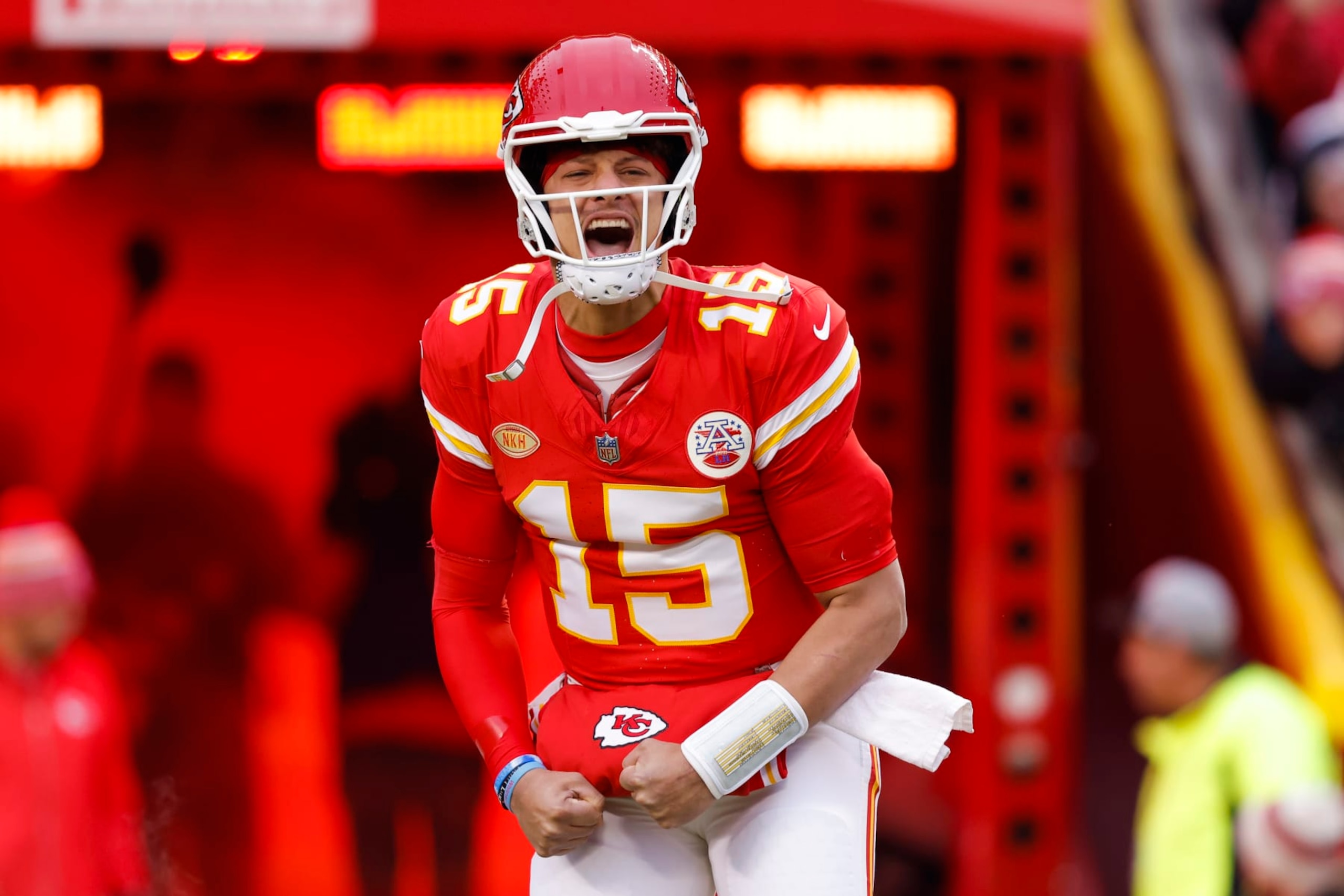 KANSAS CITY, MISSOURI - DECEMBER 31: Patrick Mahomes #15 of the Kansas City Chiefs runs onto the field before the game against the Cincinnati Bengals at GEHA Field at Arrowhead Stadium on December 31, 2023 in Kansas City, Missouri. (Photo by David Eulitt/Getty Images)