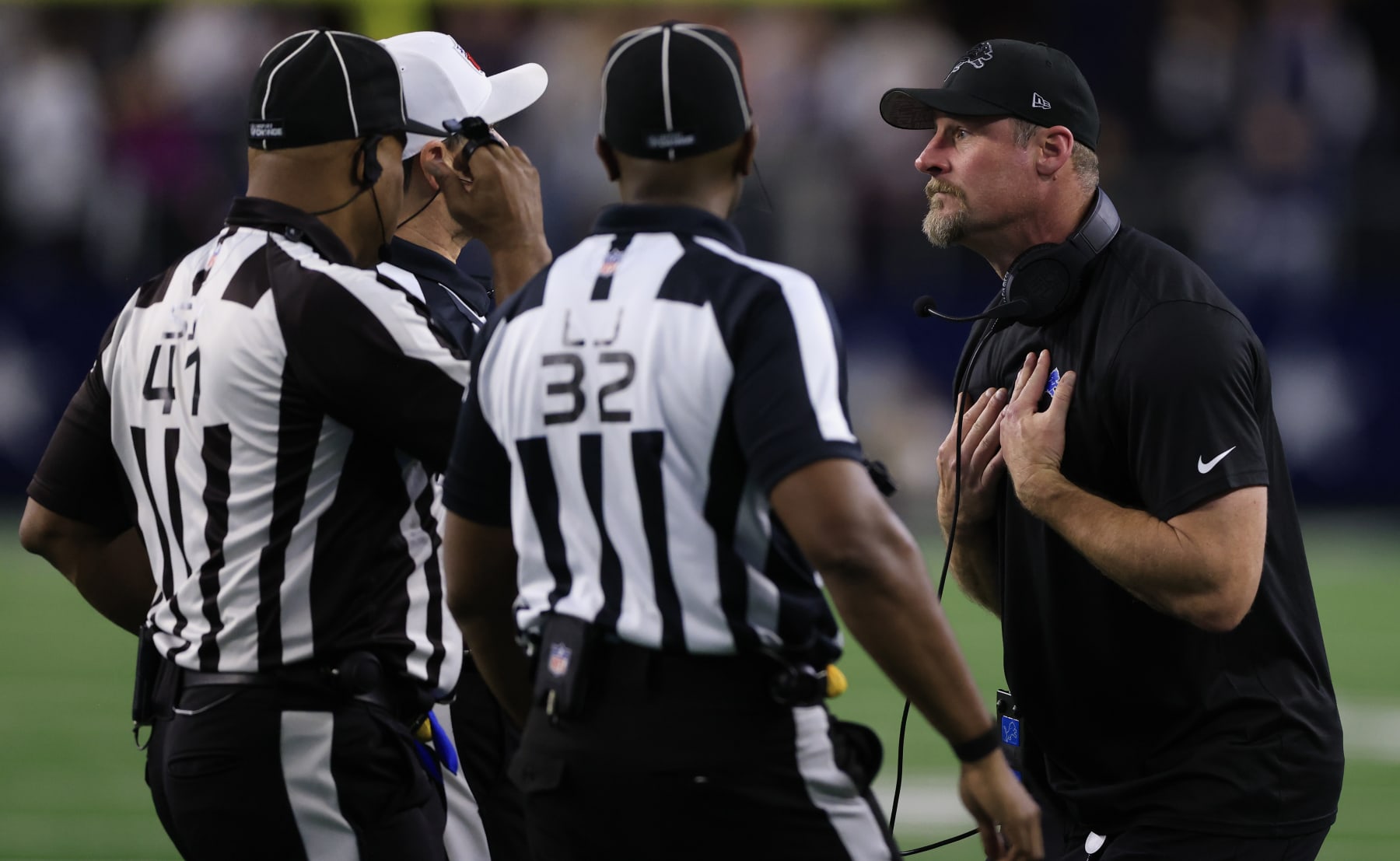 ARLINGTON, TEXAS - DECEMBER 30: Head coach Dan Campbell of the Detroit Lions reacts to a penalty during a two point conversion attempt against the Dallas Cowboys during the fourth quarter in the game at AT&T Stadium on December 30, 2023 in Arlington, Texas. (Photo by Ron Jenkins/Getty Images)