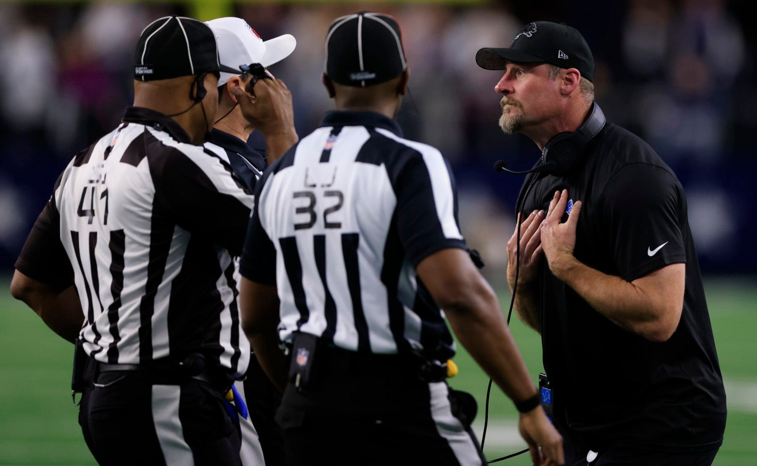 ARLINGTON, TEXAS - DECEMBER 30: Head coach Dan Campbell of the Detroit Lions reacts to a penalty during a two point conversion attempt against the Dallas Cowboys during the fourth quarter in the game at AT&T Stadium on December 30, 2023 in Arlington, Texas. (Photo by Ron Jenkins/Getty Images)