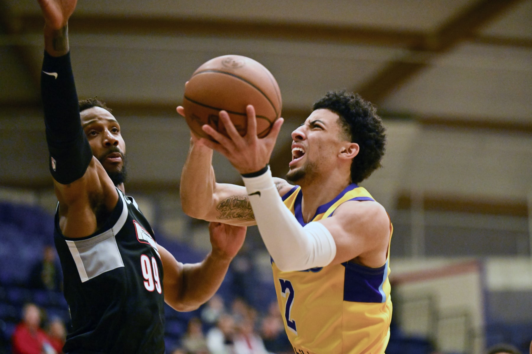 PORTLAND, OR - NOVEMBER 17: Scotty Pippen Jr. #2 of the South Bay Lakers drives the ball against Jarrey Foster #99 of the Rip City Remix on November 17, 2023 in Portland, Oregon at the Chiles Center at the University of Portland. NOTE TO USER: User expressly acknowledges and agrees that, by downloading and or using this photograph, User is consenting to the terms and conditions of the Getty Images License Agreement. Mandatory Copyright Notice: Copyright 2023 NBAE  (Photo by Alika Jenner/NBAE via Getty Images)