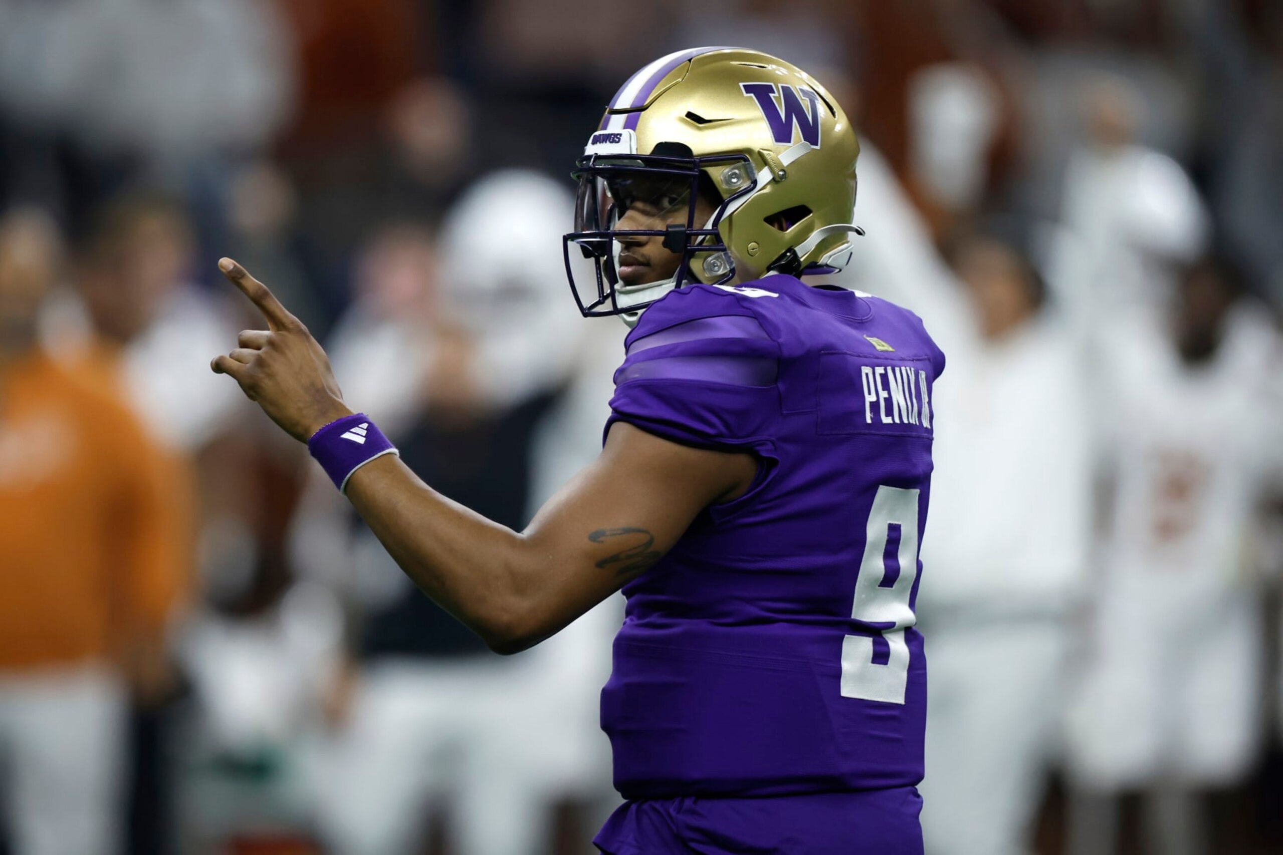 NEW ORLEANS, LOUISIANA - JANUARY 01: Michael Penix Jr. #9 of the Washington Huskies reacts during the second quarter against the Texas Longhorns during the CFP Semifinal Allstate Sugar Bowl at Caesars Superdome on January 01, 2024 in New Orleans, Louisiana. (Photo by Chris Graythen/Getty Images)