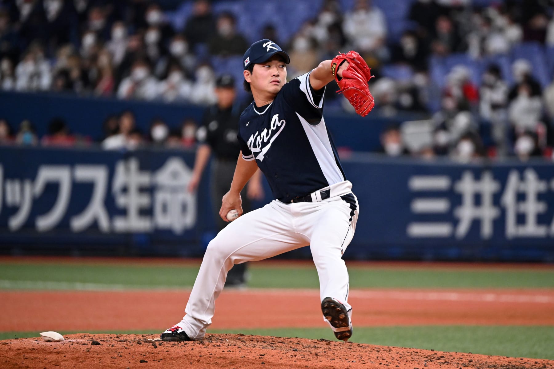 OSAKA, JAPAN - MARCH 06: Pitcher Woo Suk Go #19 of Korea throws in the seventh inning during the World Baseball Classic exhibition game between Korea and Orix Buffaloes at Kyocera Dome Osaka on March 6, 2023 in Osaka, Japan. (Photo by Kenta Harada/Getty Images)