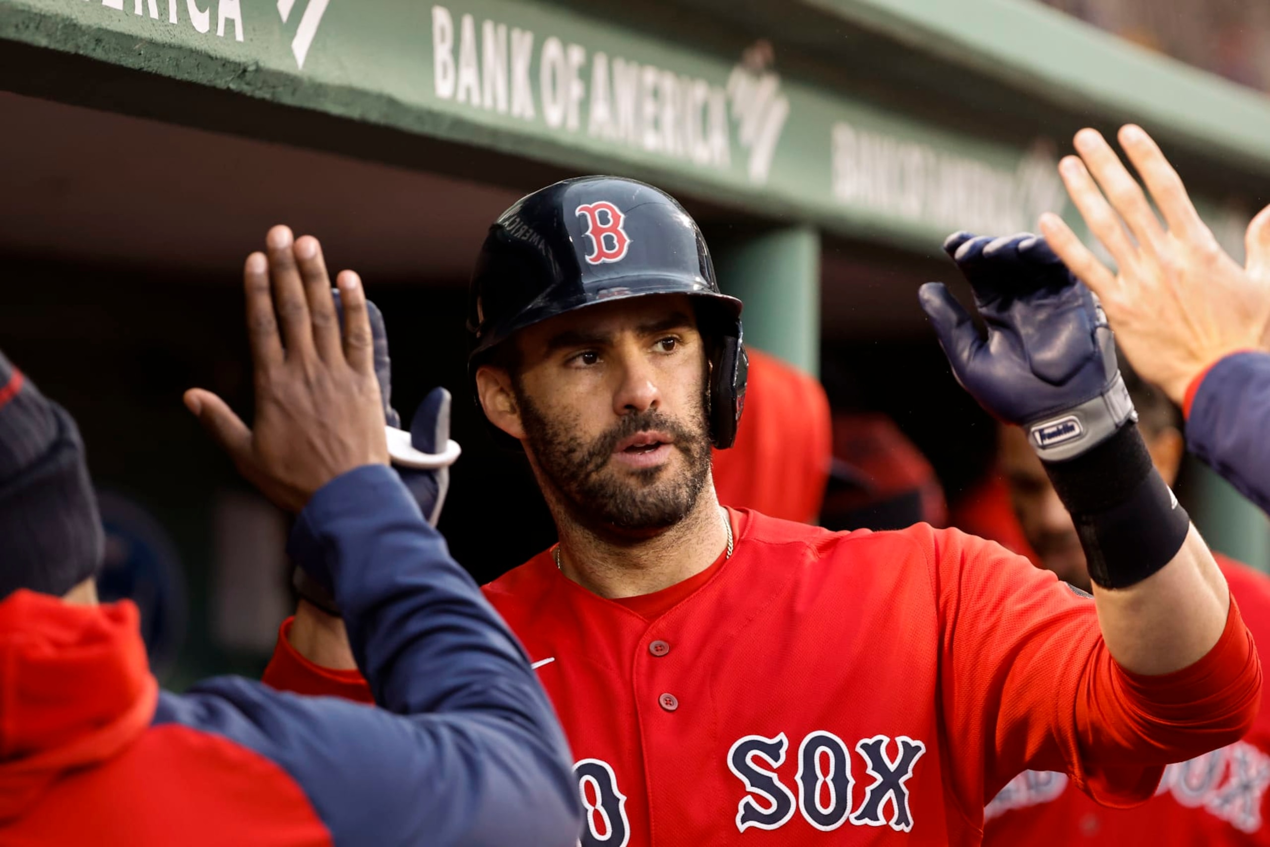 BOSTON, MA - OCTOBER 5: J.D. Martinez #28 of the Boston Red Sox is congratulated in the dugout after his home run, his second of the game, during the fourth inning against the Tampa Bay Rays at Fenway Park on October 5, 2022 in Boston, Massachusetts. (Photo By Winslow Townson/Getty Images) BOSTON, MA - OCTOBER 5: J.D. Martinez #28 of the Boston Red Sox is congratulated in the dugout after his home run, his second of the game, during the fourth inning against the Tampa Bay Rays at Fenway Park on October 5, 2022 in Boston, Massachusetts. (Photo By Winslow Townson/Getty Images)