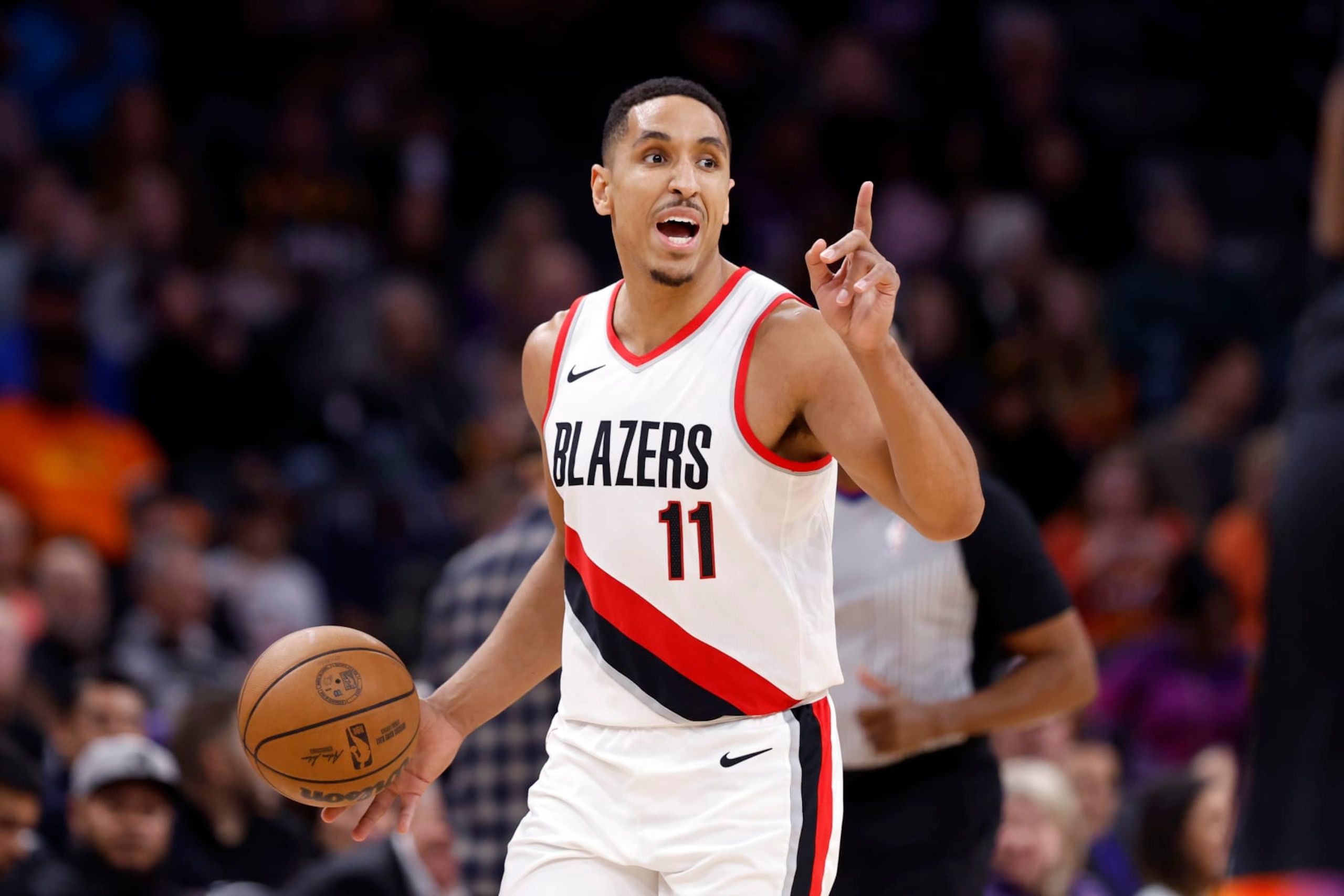 PHOENIX, ARIZONA - JANUARY 01: Malcolm Brogdon #11 of the Portland Trail Blazers in action during the game against the Phoenix Suns at Footprint Center on January 01, 2024 in Phoenix, Arizona. The Suns defeated the Trail Blazers 109-88. NOTE TO USER: User expressly acknowledges and agrees that, by downloading and or using this photograph, User is consenting to the terms and conditions of the Getty Images License Agreement. (Photo by Chris Coduto/Getty Images) PHOENIX, ARIZONA - JANUARY 01: Malcolm Brogdon #11 of the Portland Trail Blazers in action during the game against the Phoenix Suns at Footprint Center on January 01, 2024 in Phoenix, Arizona. The Suns defeated the Trail Blazers 109-88. NOTE TO USER: User expressly acknowledges and agrees that, by downloading and or using this photograph, User is consenting to the terms and conditions of the Getty Images License Agreement. (Photo by Chris Coduto/Getty Images)