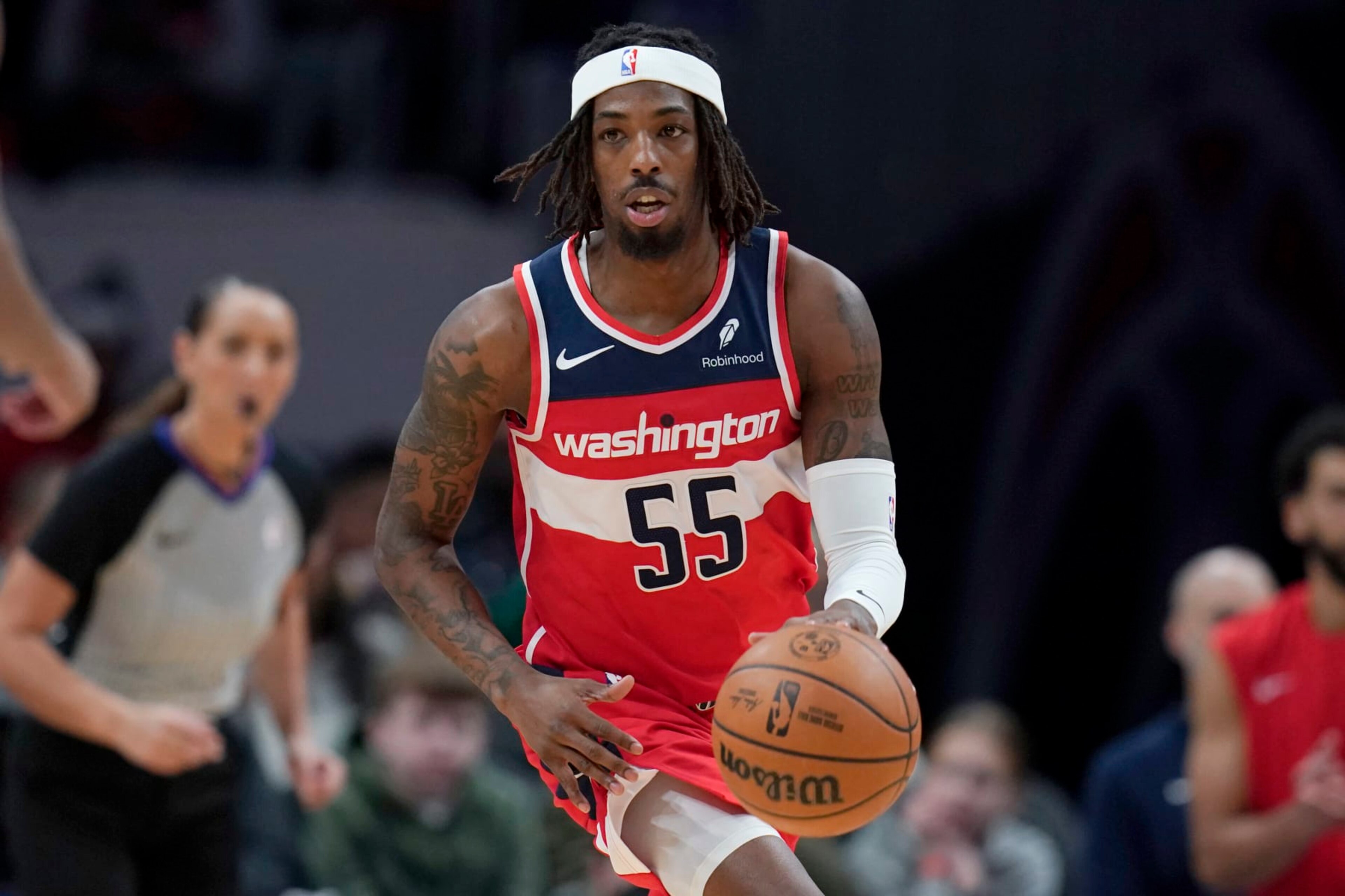 WASHINGTON, DC - DECEMBER 29: Delon Wright #55 of the Washington Wizards dribbles the ball during the first half against the Brooklyn Nets at Capital One Arena on December 29, 2023 in Washington, DC. NOTE TO USER: User expressly acknowledges and agrees that, by downloading and or using this photograph, User is consenting to the terms and conditions of the Getty Images License Agreement. (Photo by Jess Rapfogel/Getty Images)