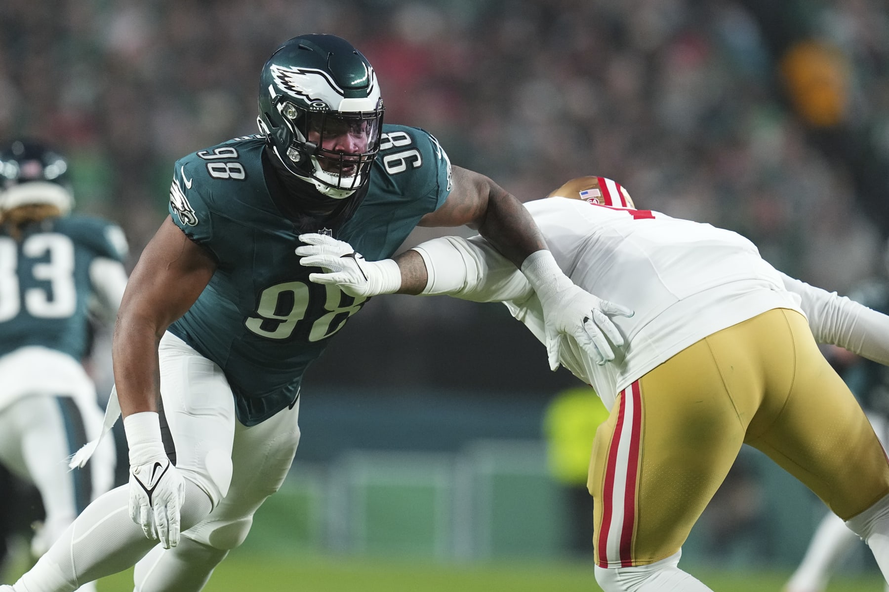 PHILADELPHIA, PENNSYLVANIA - DECEMBER 3: Jalen Carter #98 of the Philadelphia Eagles rushes the passer against Trent Williams #71 of the San Francisco 49ers at Lincoln Financial Field on December 3, 2023 in Philadelphia, Pennsylvania. (Photo by Mitchell Leff/Getty Images)