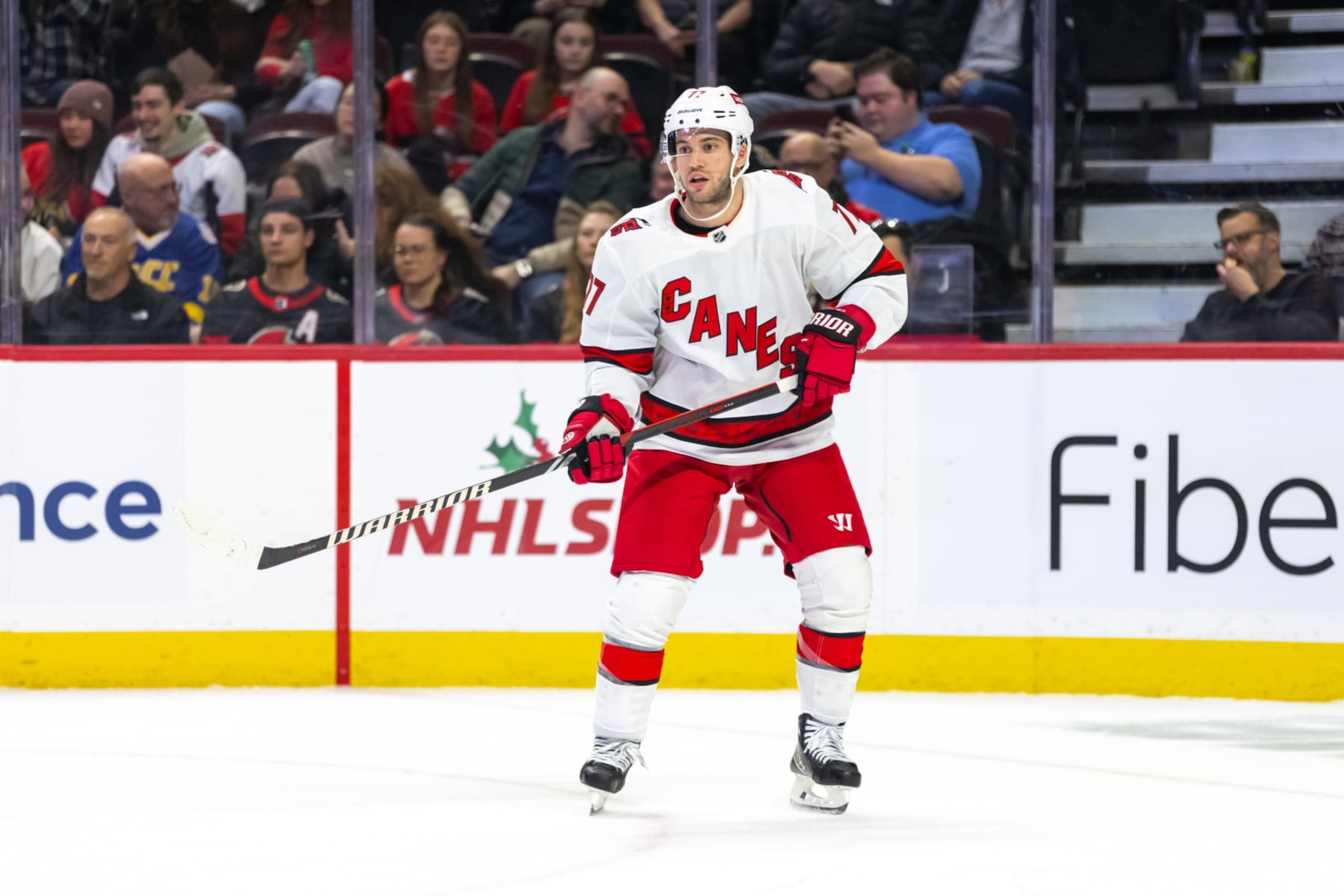 OTTAWA, ON - DECEMBER 12: Carolina Hurricanes Defenceman Tony DeAngelo (77) keeps eyes on the play during first period National Hockey League action between the Carolina Hurricanes and Ottawa Senators on December 12, 2023, at Canadian Tire Centre in Ottawa, ON, Canada. (Photo by Richard A. Whittaker/Icon Sportswire via Getty Images) OTTAWA, ON - DECEMBER 12: Carolina Hurricanes Defenceman Tony DeAngelo (77) keeps eyes on the play during first period National Hockey League action between the Carolina Hurricanes and Ottawa Senators on December 12, 2023, at Canadian Tire Centre in Ottawa, ON, Canada. (Photo by Richard A. Whittaker/Icon Sportswire via Getty Images)