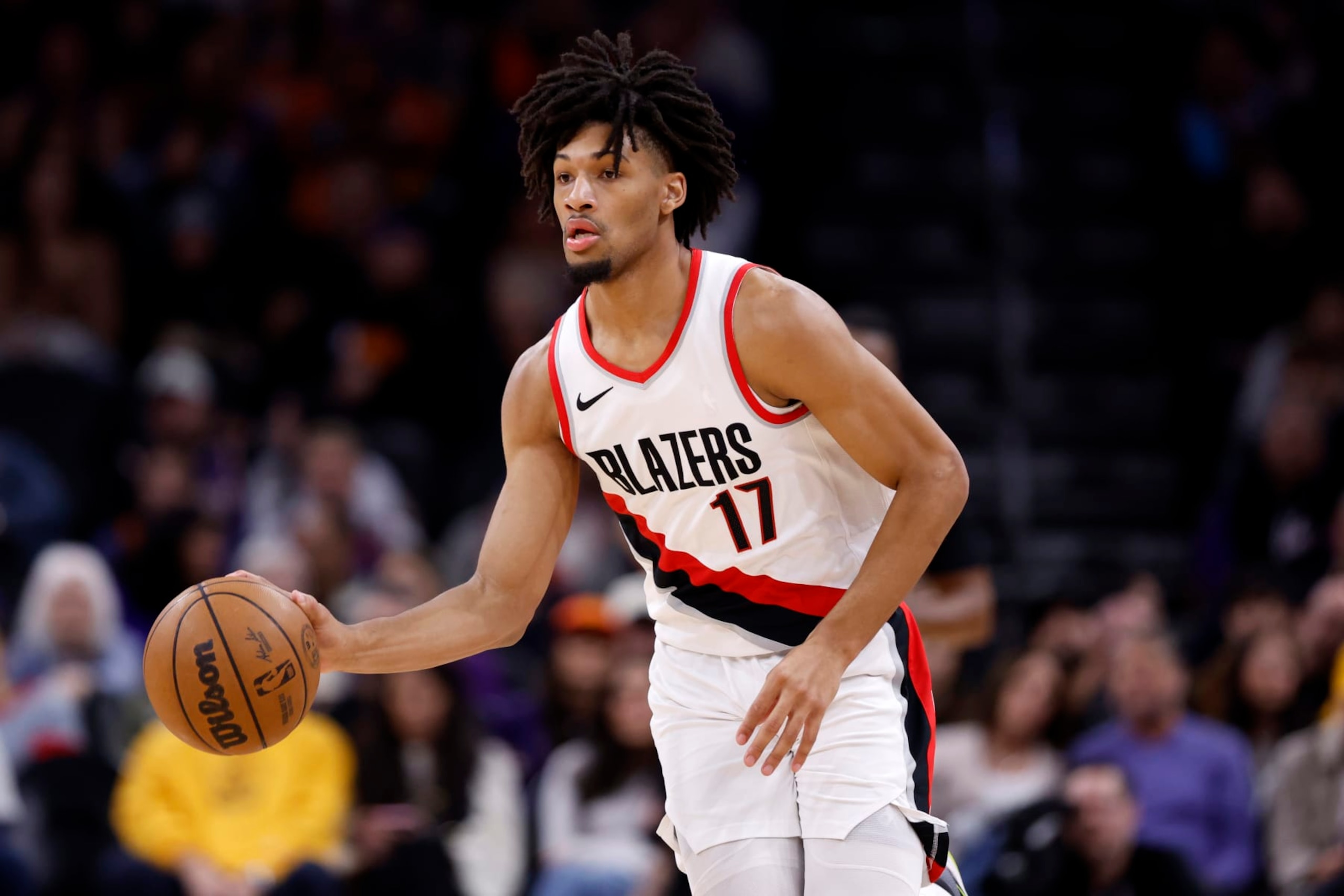 PHOENIX, ARIZONA - JANUARY 01: Shaedon Sharpe #17 of the Portland Trail Blazers controls the ball during the game against the Phoenix Suns at Footprint Center on January 01, 2024 in Phoenix, Arizona. The Suns defeated the Trail Blazers 109-88. NOTE TO USER: User expressly acknowledges and agrees that, by downloading and or using this photograph, User is consenting to the terms and conditions of the Getty Images License Agreement.  (Photo by Chris Coduto/Getty Images)
