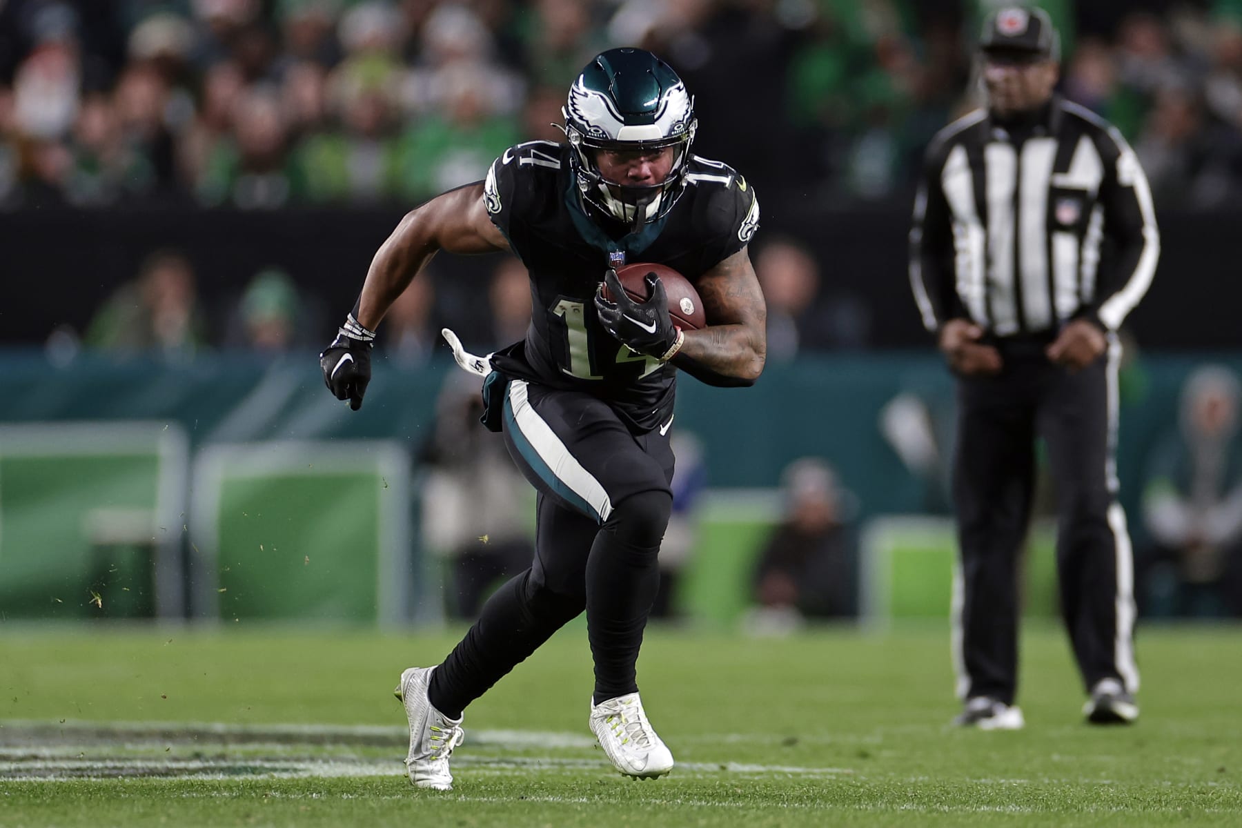 PHILADELPHIA, PENNSYLVANIA - DECEMBER 25: Kenneth Gainwell #14 of the Philadelphia Eagles runs with the ball against the New York Giants at Lincoln Financial Field on December 25, 2023 in Philadelphia, Pennsylvania. (Photo by Adam Hunger/Getty Images)