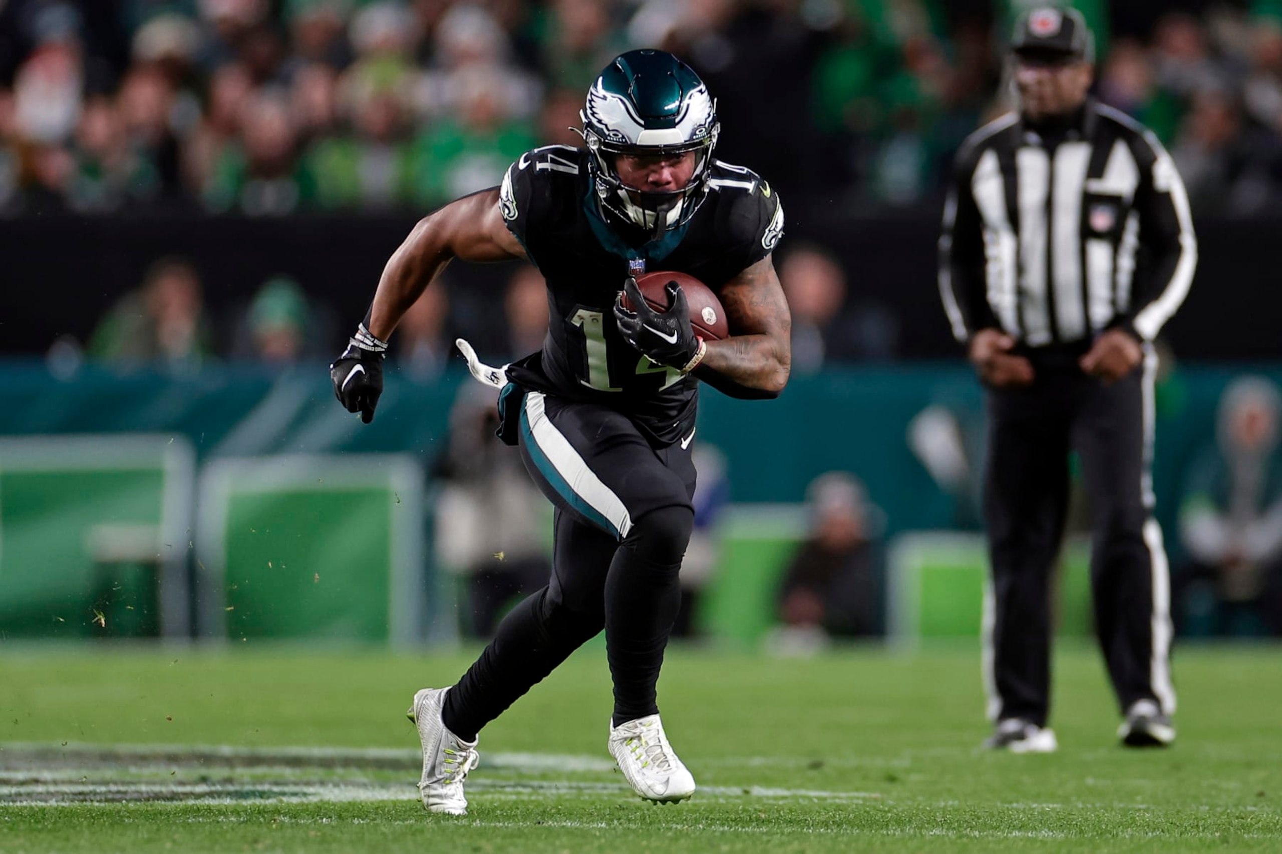 PHILADELPHIA, PENNSYLVANIA - DECEMBER 25: Kenneth Gainwell #14 of the Philadelphia Eagles runs with the ball against the New York Giants at Lincoln Financial Field on December 25, 2023 in Philadelphia, Pennsylvania. (Photo by Adam Hunger/Getty Images)
