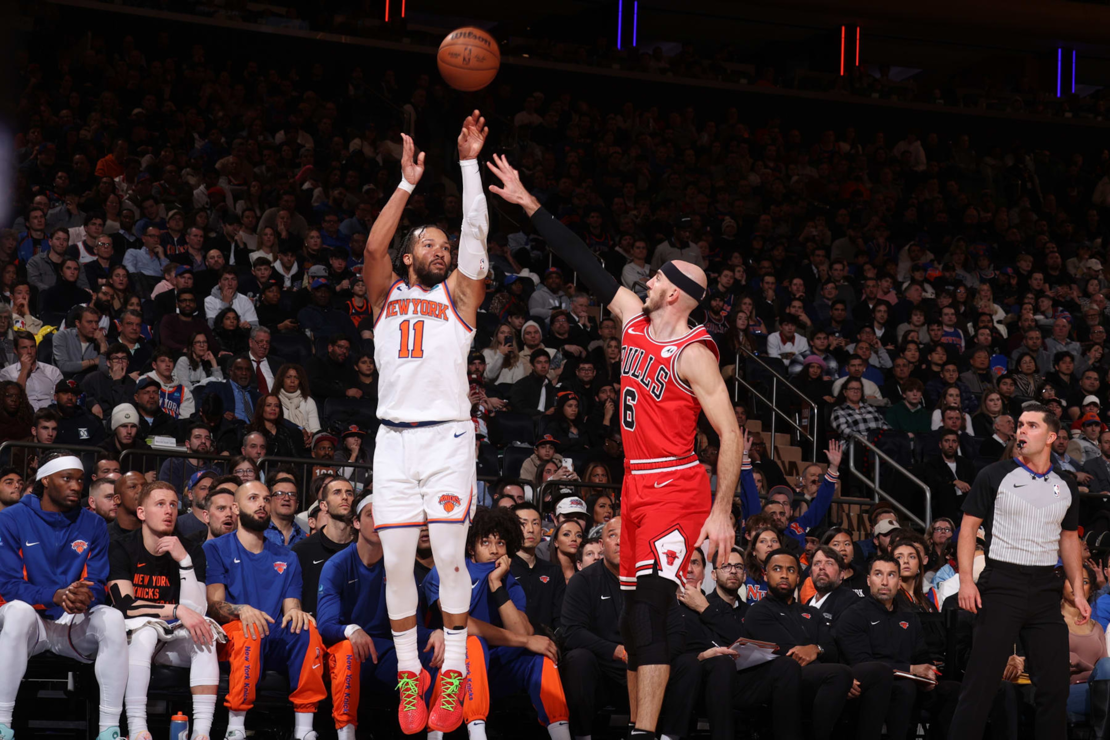 NEW YORK, NY - JANUARY 3: Jalen Brunson #11 of the New York Knicks shoots a three point basket against the Chicago Bulls on January 3, 2024 at Madison Square Garden in New York City, New York. NOTE TO USER: User expressly acknowledges and agrees that, by downloading and or using this photograph, User is consenting to the terms and conditions of the Getty Images License Agreement. Mandatory Copyright Notice: Copyright 2024 NBAE (Photo by Nathaniel S. Butler/NBAE via Getty Images) NEW YORK, NY - JANUARY 3: Jalen Brunson #11 of the New York Knicks shoots a three point basket against the Chicago Bulls on January 3, 2024 at Madison Square Garden in New York City, New York. NOTE TO USER: User expressly acknowledges and agrees that, by downloading and or using this photograph, User is consenting to the terms and conditions of the Getty Images License Agreement. Mandatory Copyright Notice: Copyright 2024 NBAE (Photo by Nathaniel S. Butler/NBAE via Getty Images)
