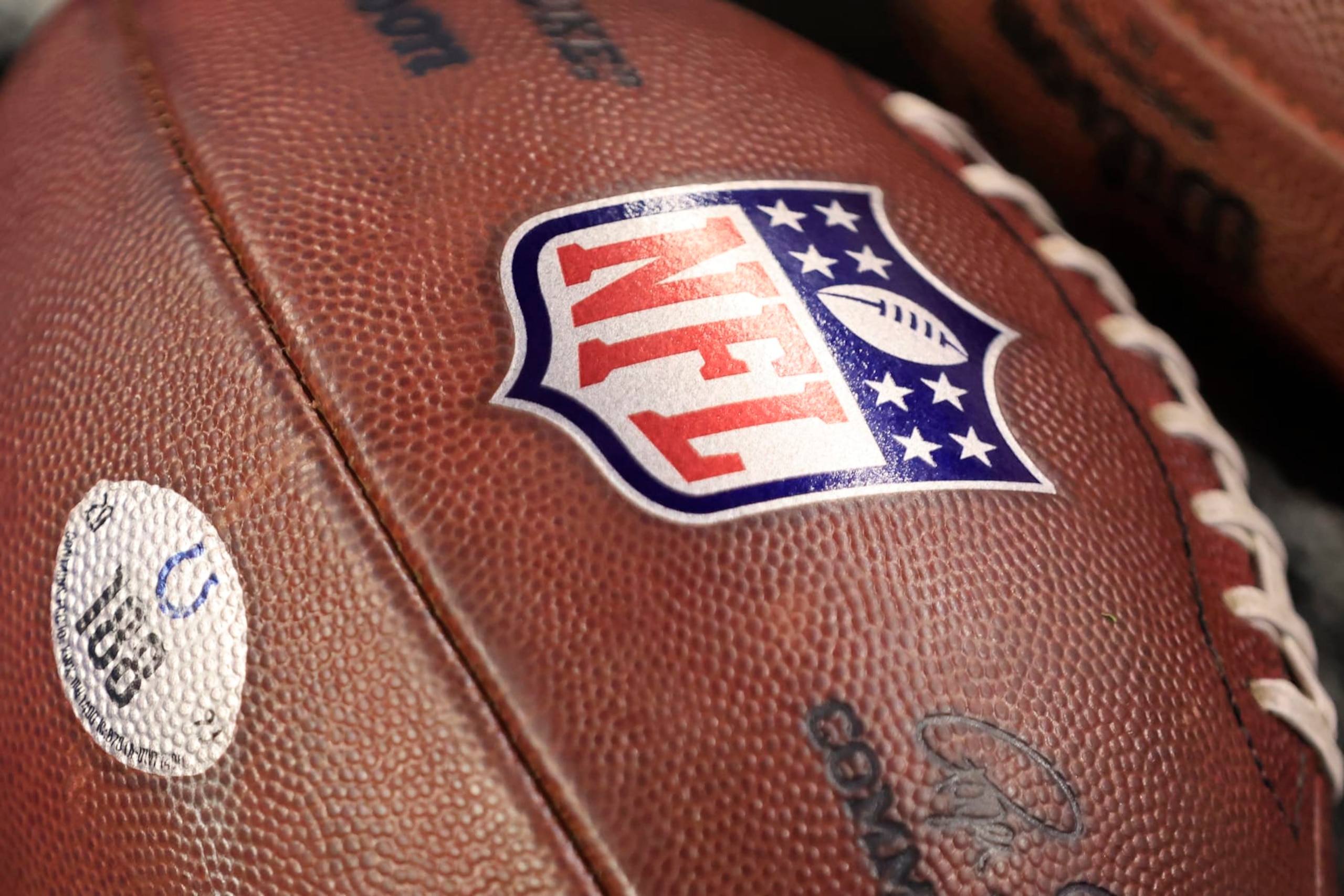 INDIANAPOLIS, INDIANA - DECEMBER 16: Detailed view of the NFL logo prior to the game between Pittsburgh Steelers and the Indianapolis Colts at Lucas Oil Stadium on December 16, 2023 in Indianapolis, Indiana. (Photo by Justin Casterline/Getty Images) INDIANAPOLIS, INDIANA - DECEMBER 16: Detailed view of the NFL logo prior to the game between Pittsburgh Steelers and the Indianapolis Colts at Lucas Oil Stadium on December 16, 2023 in Indianapolis, Indiana. (Photo by Justin Casterline/Getty Images)